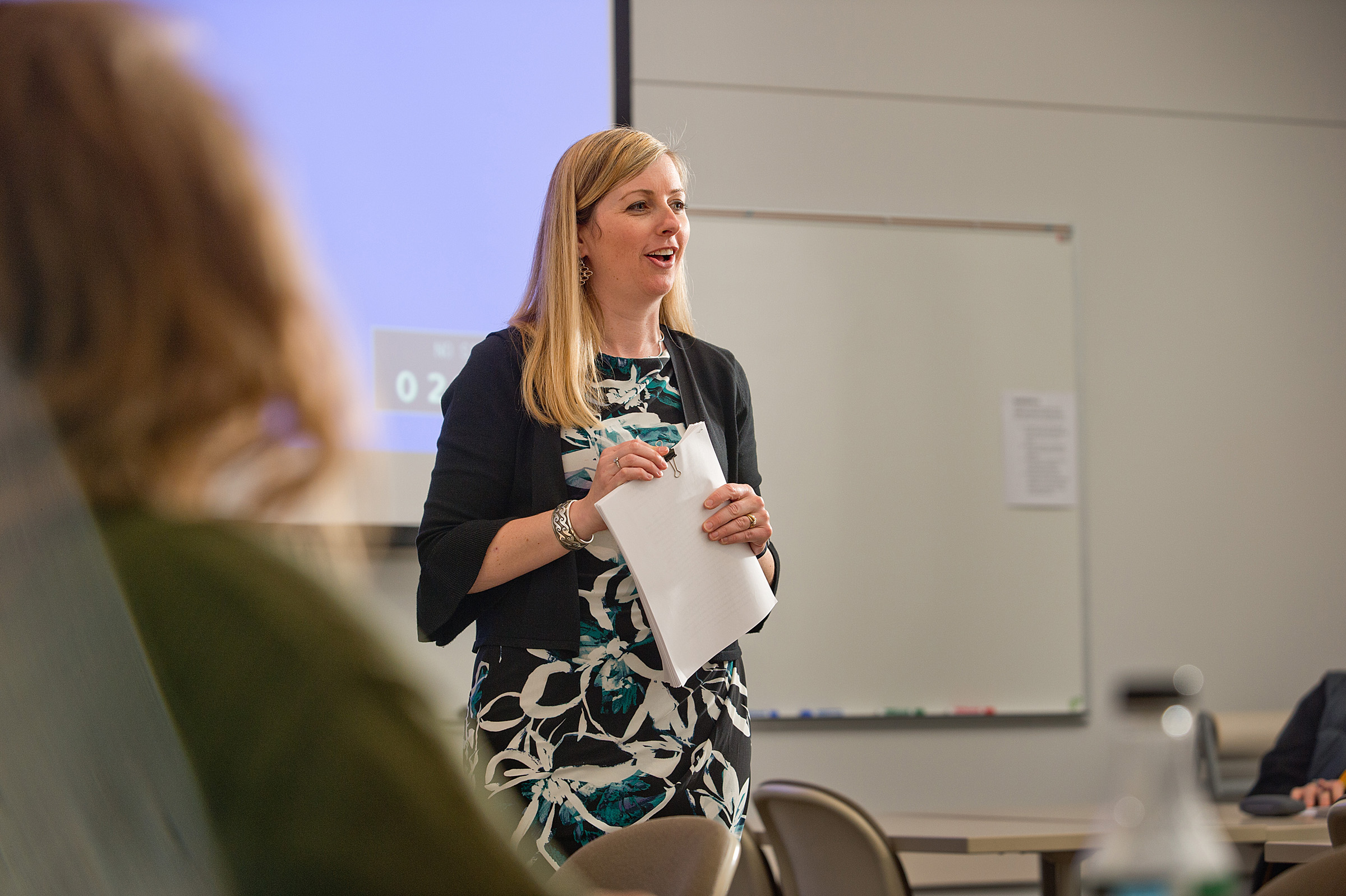 Melissa Askren-Edgehouse teaching students in a classroom 