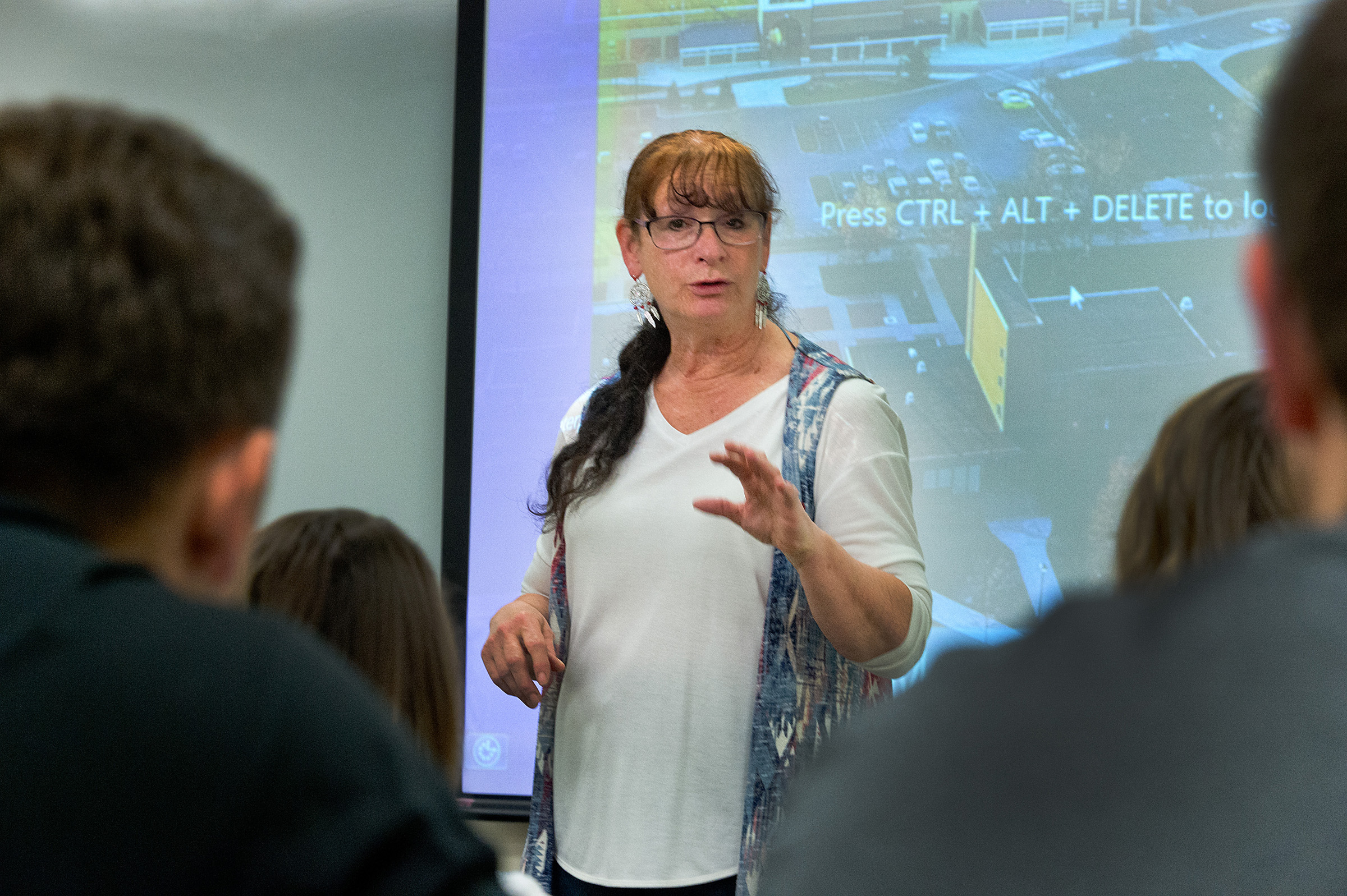 Theresa Davis lecturing students in a classroom 