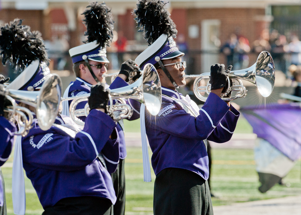 Purple Raider Marching Band Members Playing Instruments