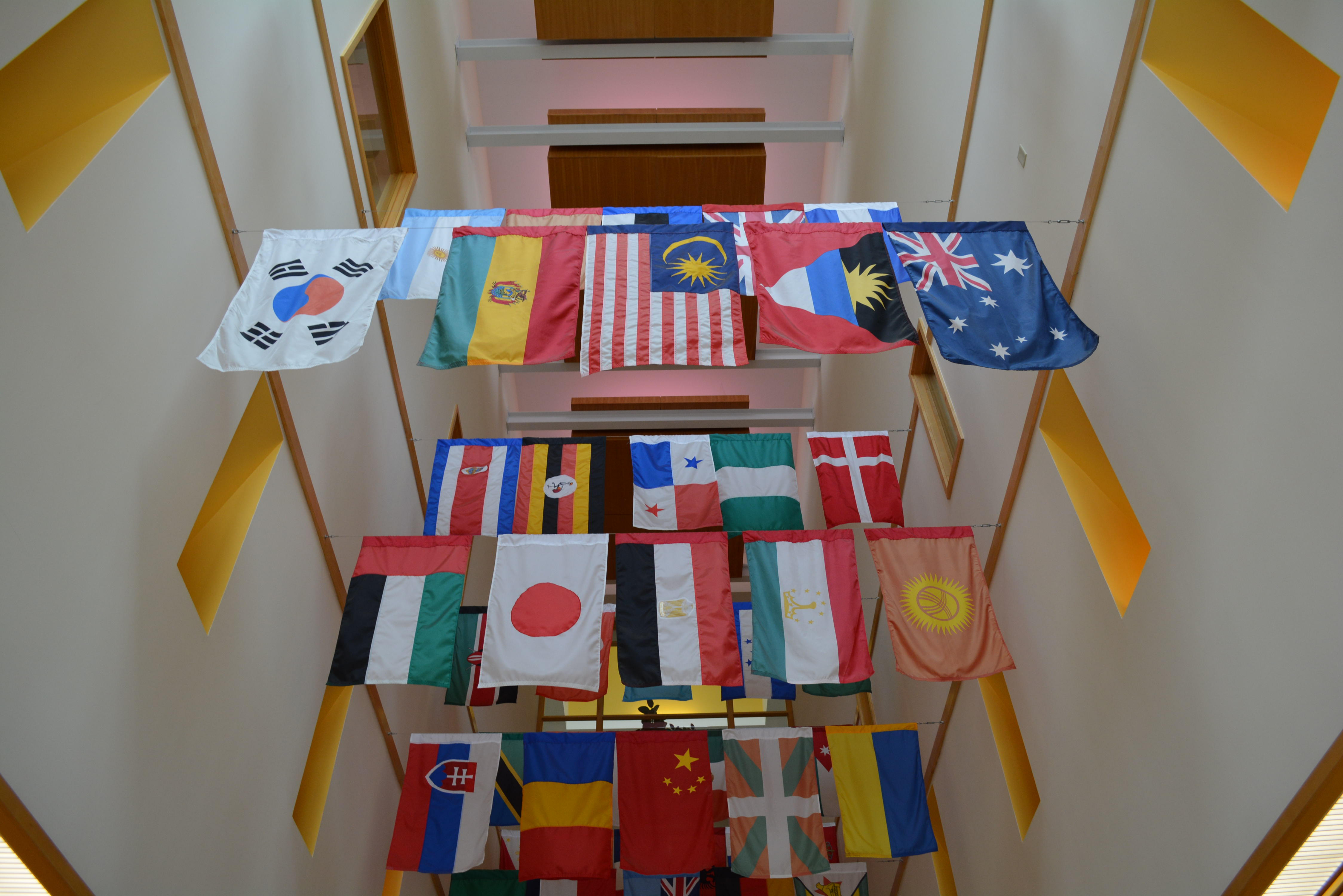 World flags hanging in a hallway