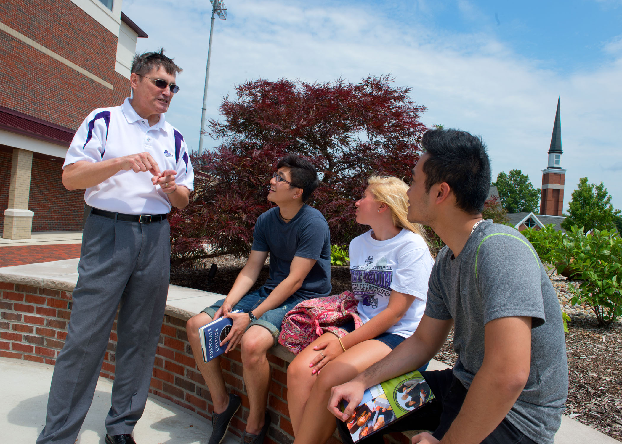 University of Mount Union students and professor outside