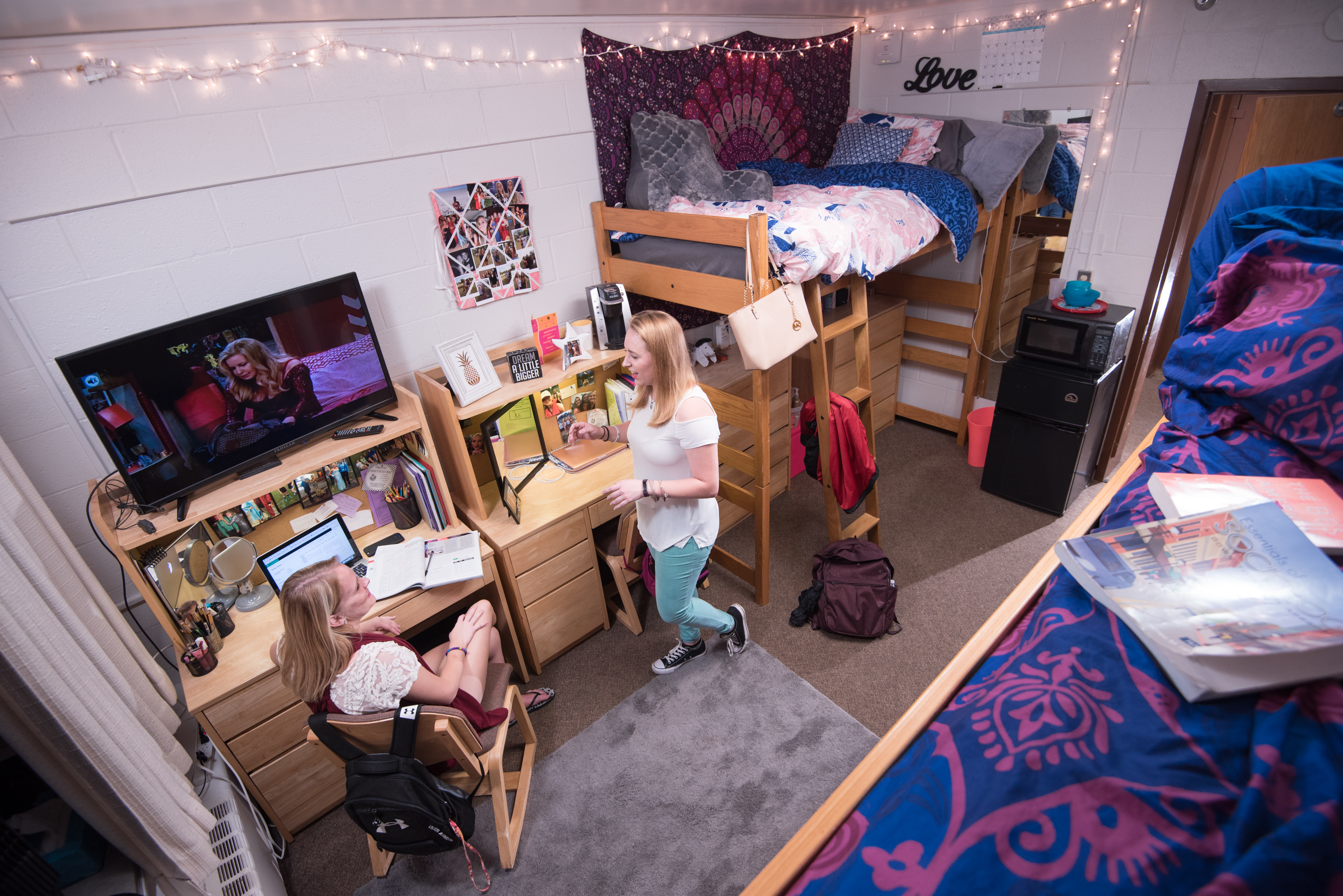 Students gathering in a residence hall room 