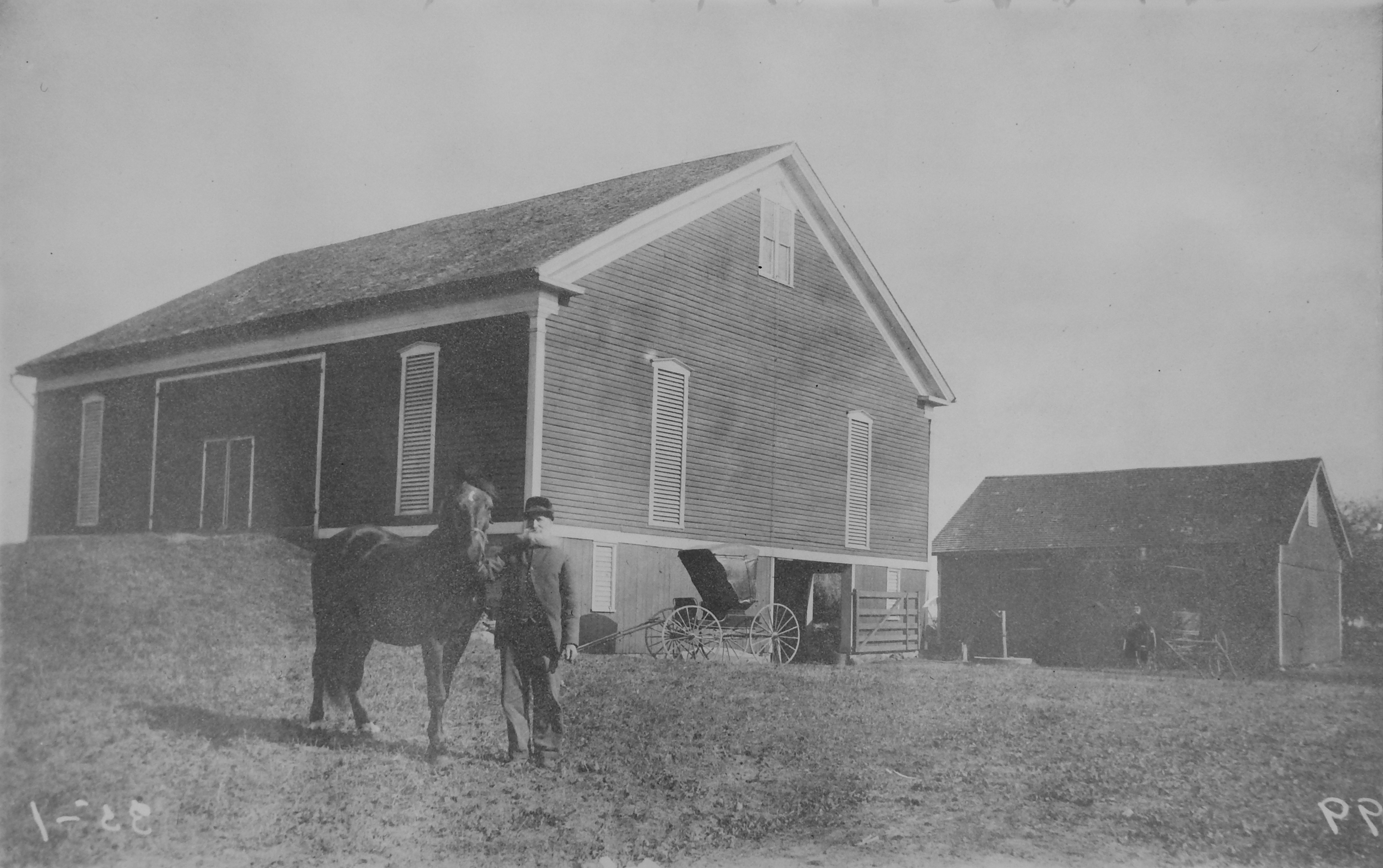 Mr. John T. Huston and the Huston Barn