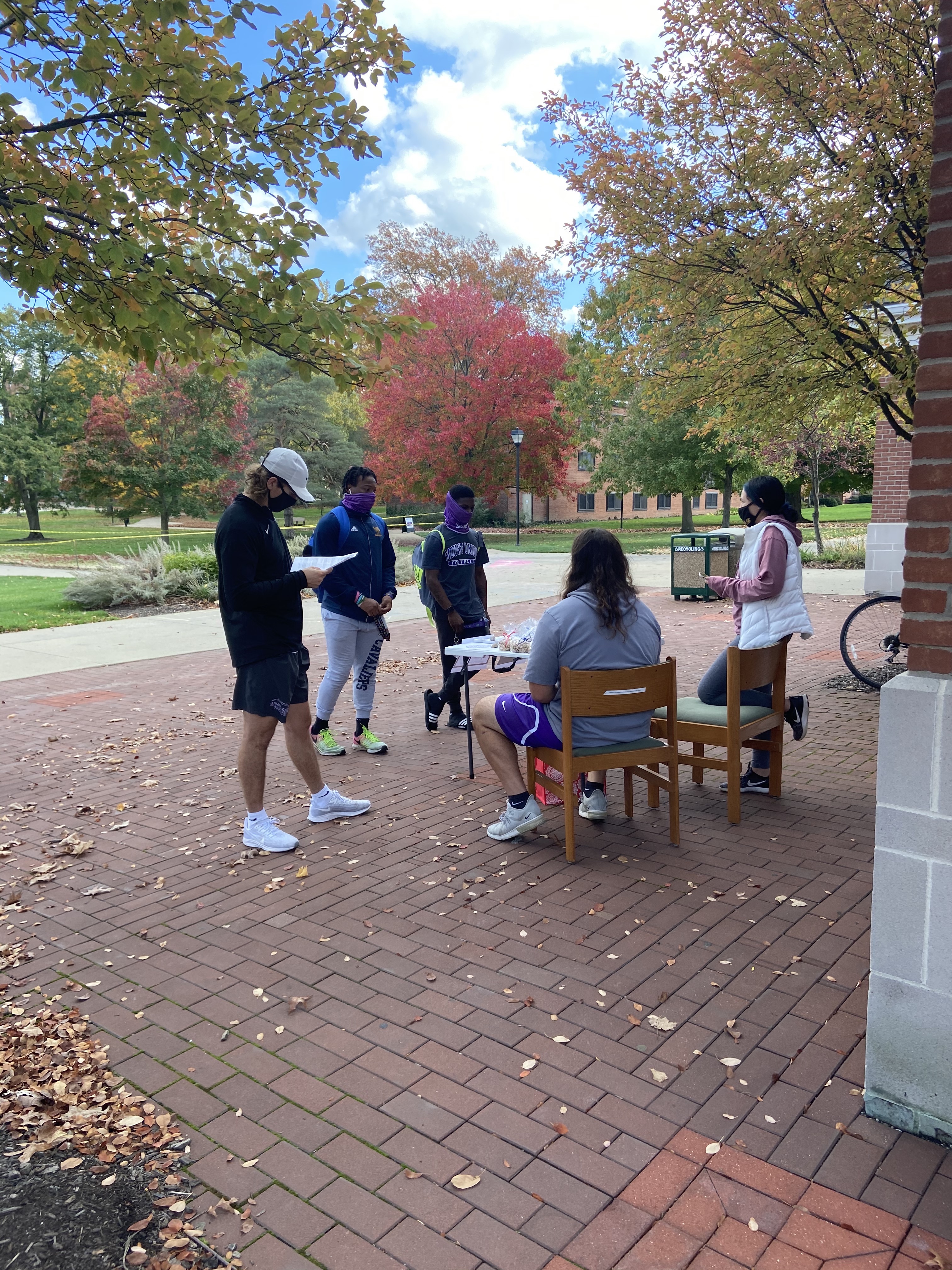 students registering to vote on campus