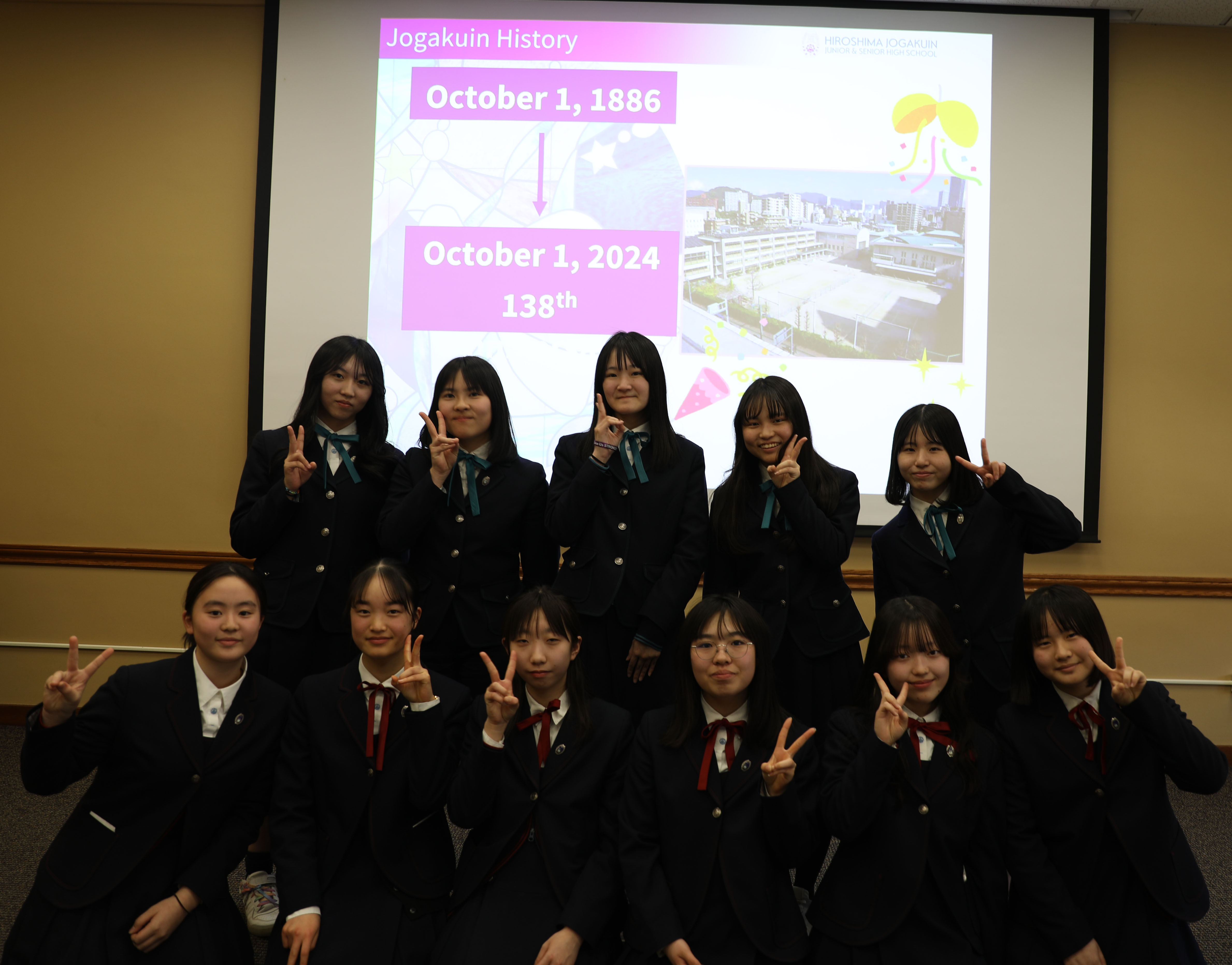 Hiroshima visiting students giving a presentation