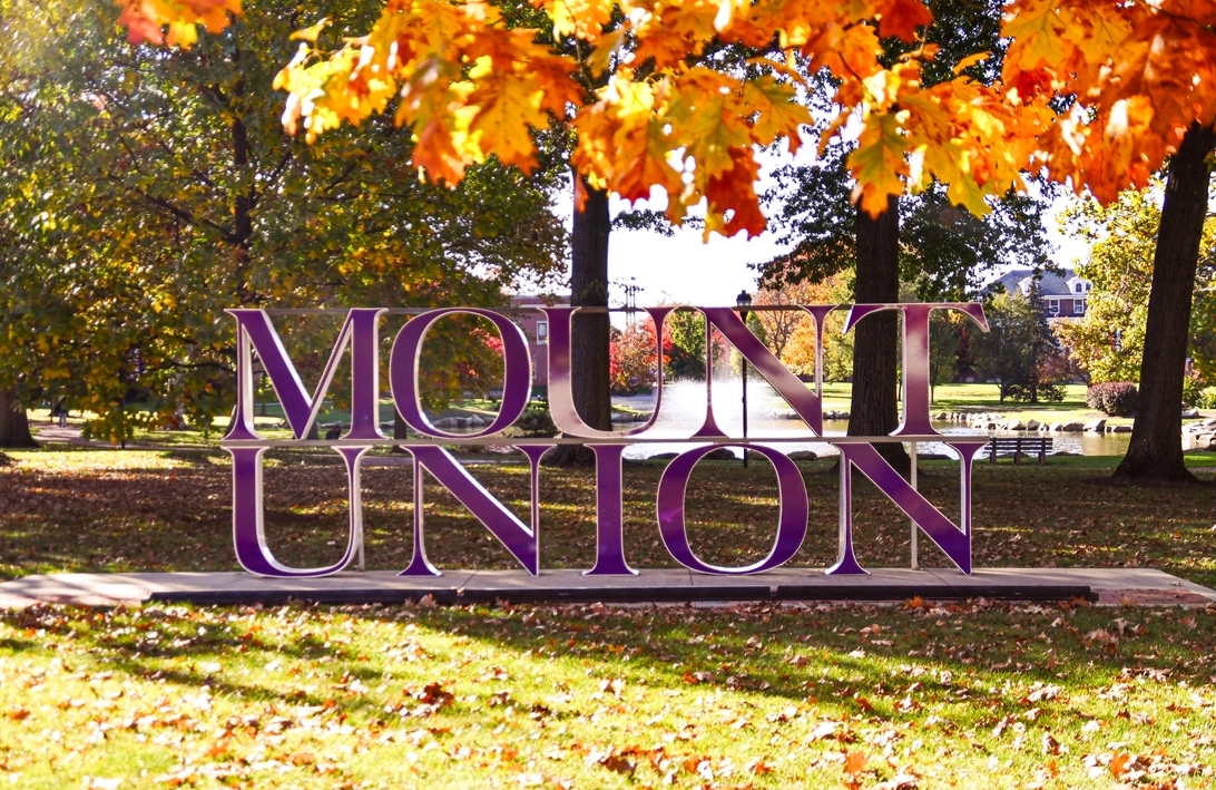 mount union sign with fall foliage