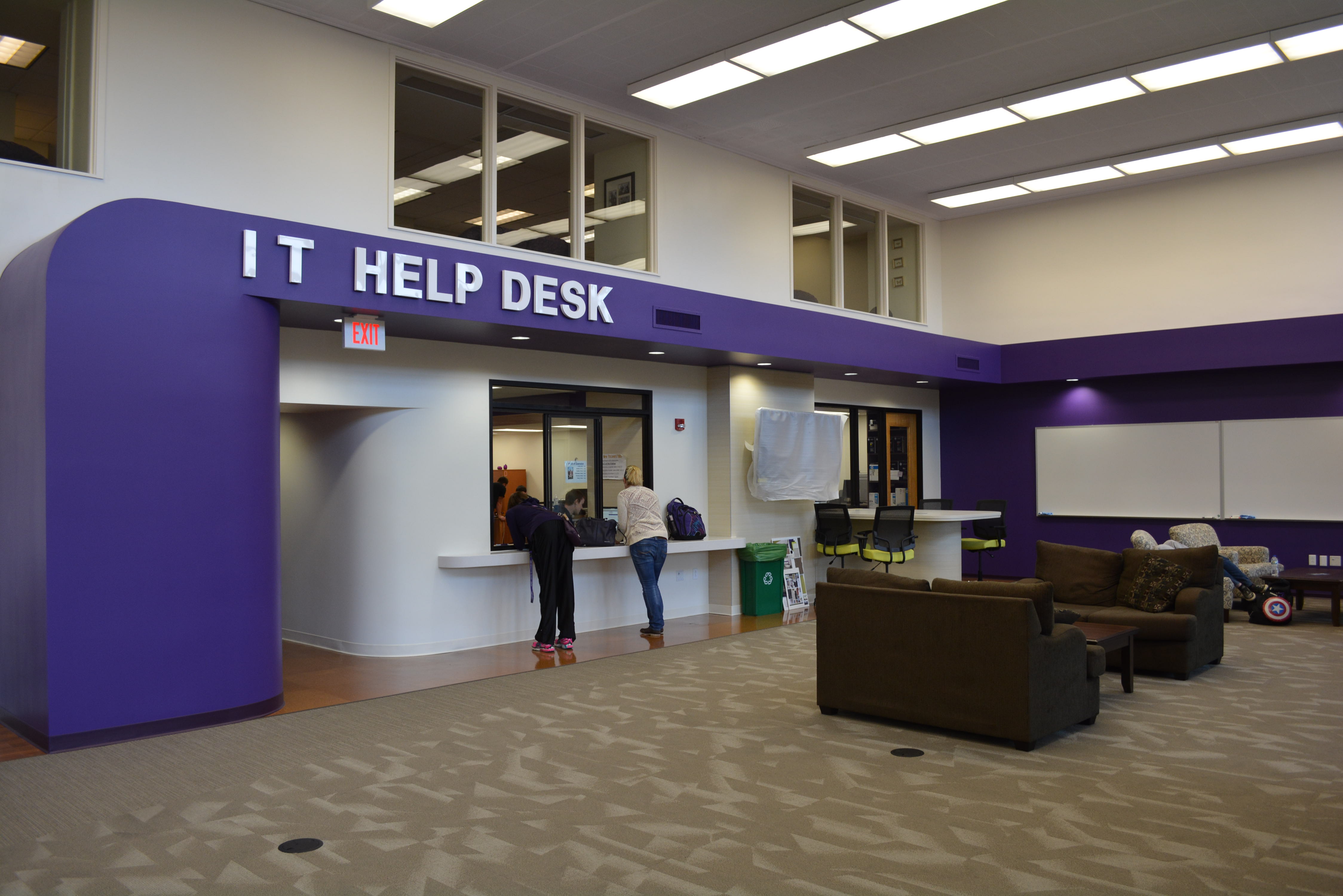 Students getting assistance from the IT HelpDesk at the University of Mount Union