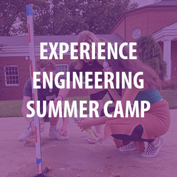 A photo of the engineering summer camp with the words "Experience Engineering Summer Camp" in white in front. 