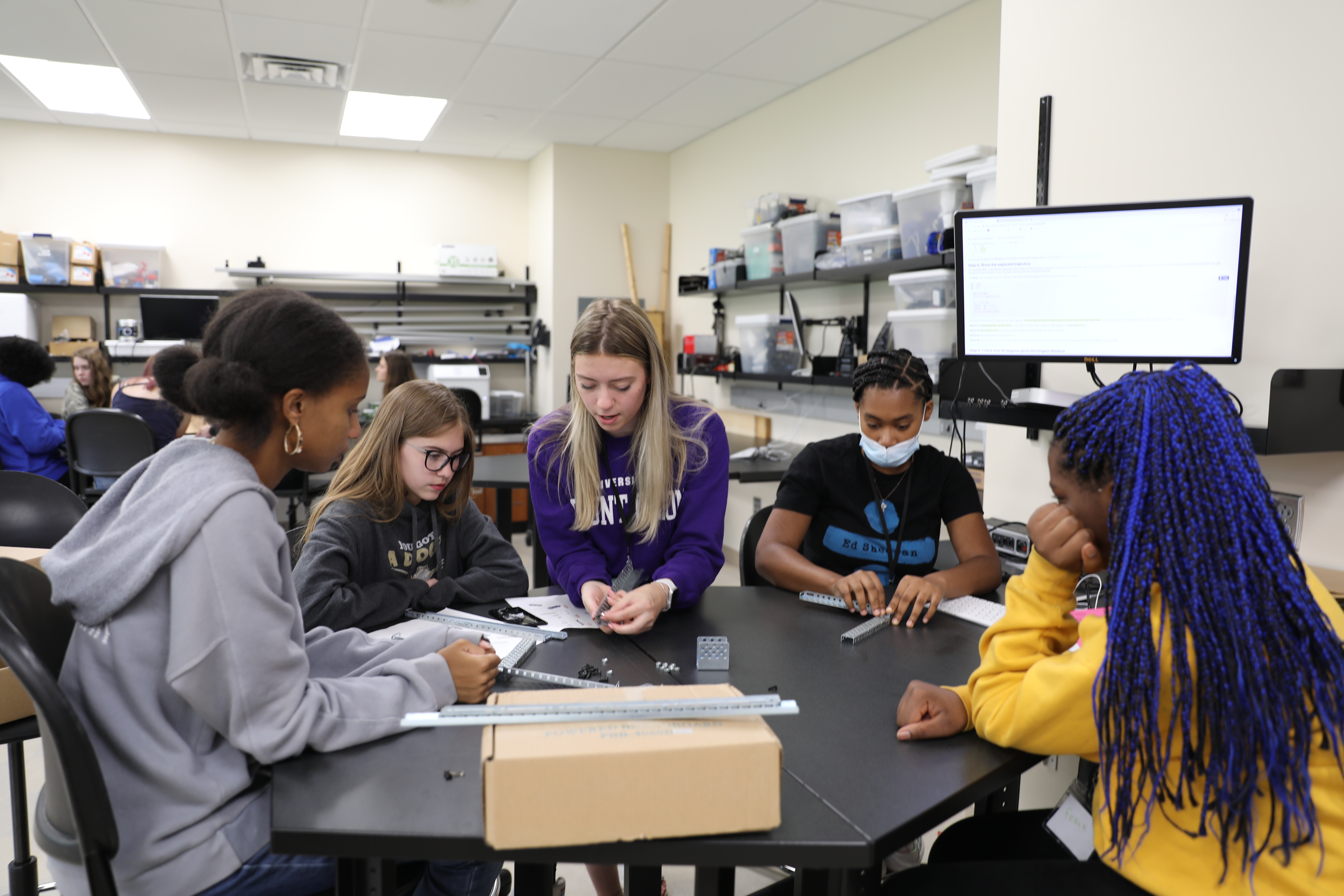 Stemcoding students and staff work on a "Robot Racing Competition" at the University of Mount Union
