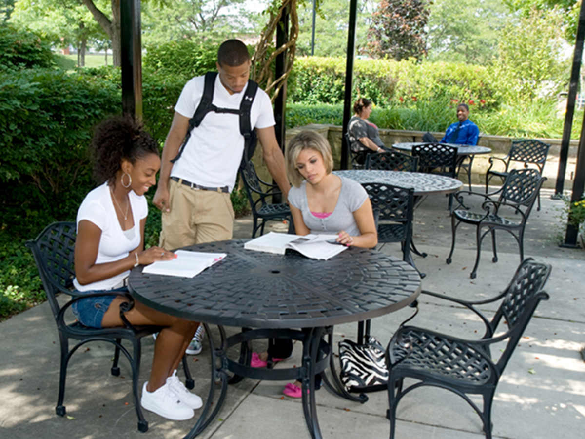 Students studying on the patio of the Hoover-Price Campus Center