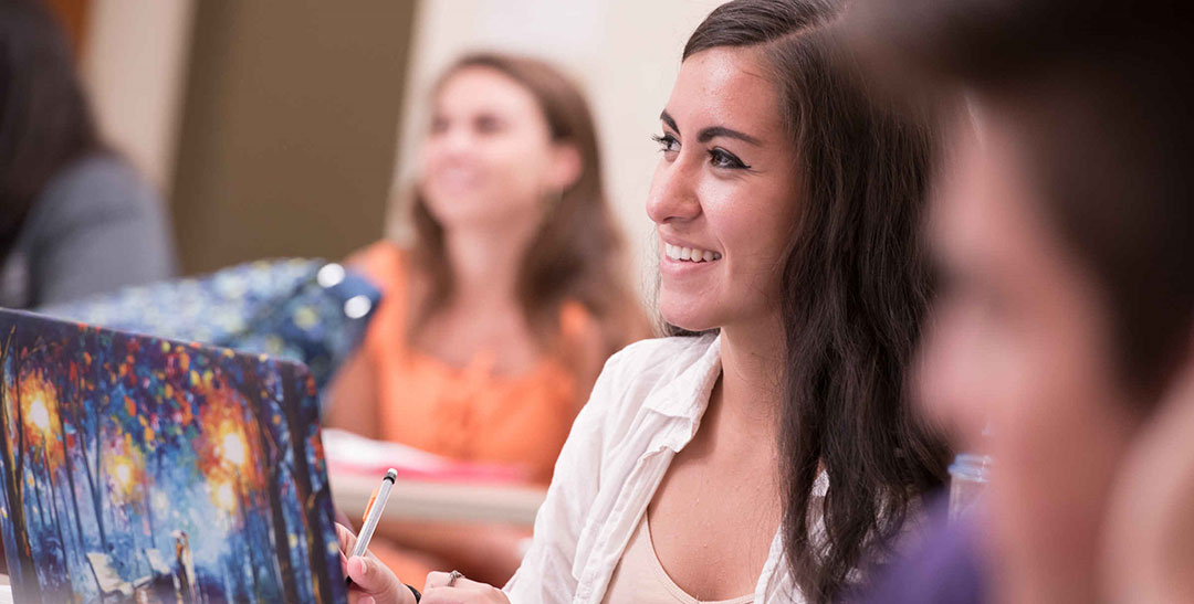 Students studying in a classroom at the University of Mount Union.