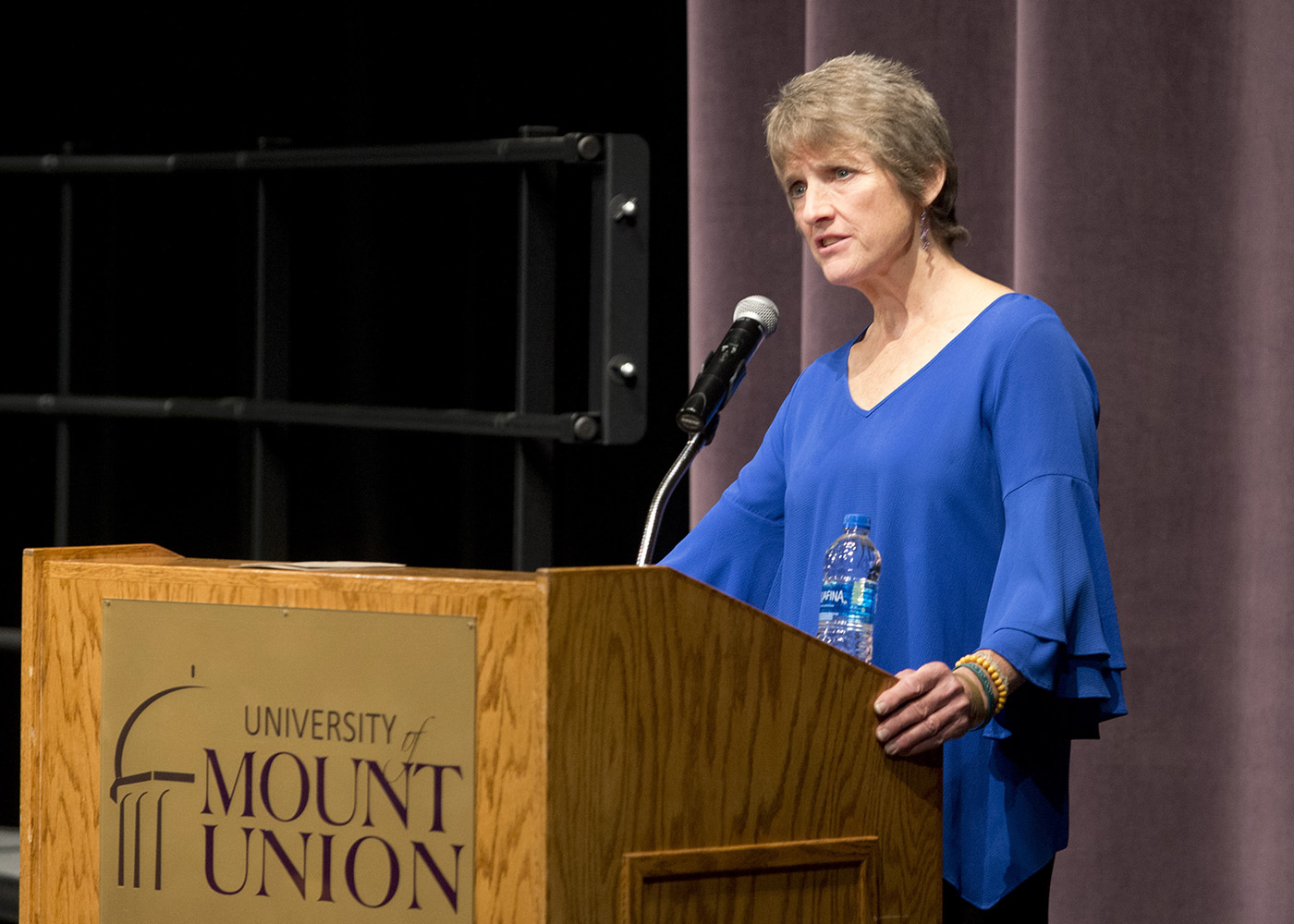 Dr. Sheryl Holt speaking at Mount Union's PT White Coat ceremony