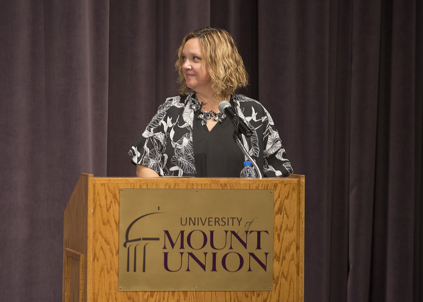 Dr. Megan Salvatore speaking at Mount Union's PT White Coat ceremony