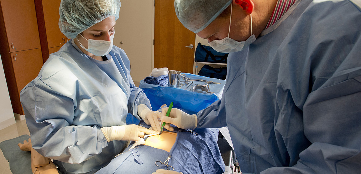 PA students learning in an ER lab