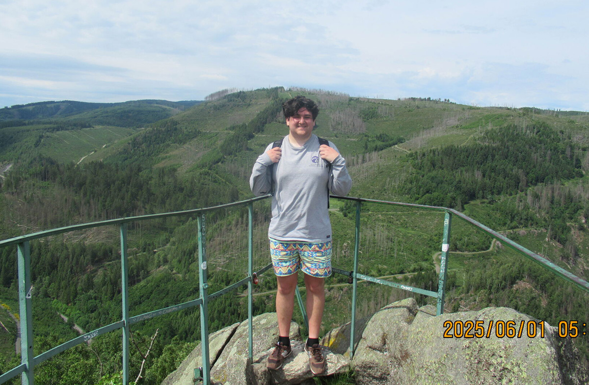 Moyer standing on cliffs