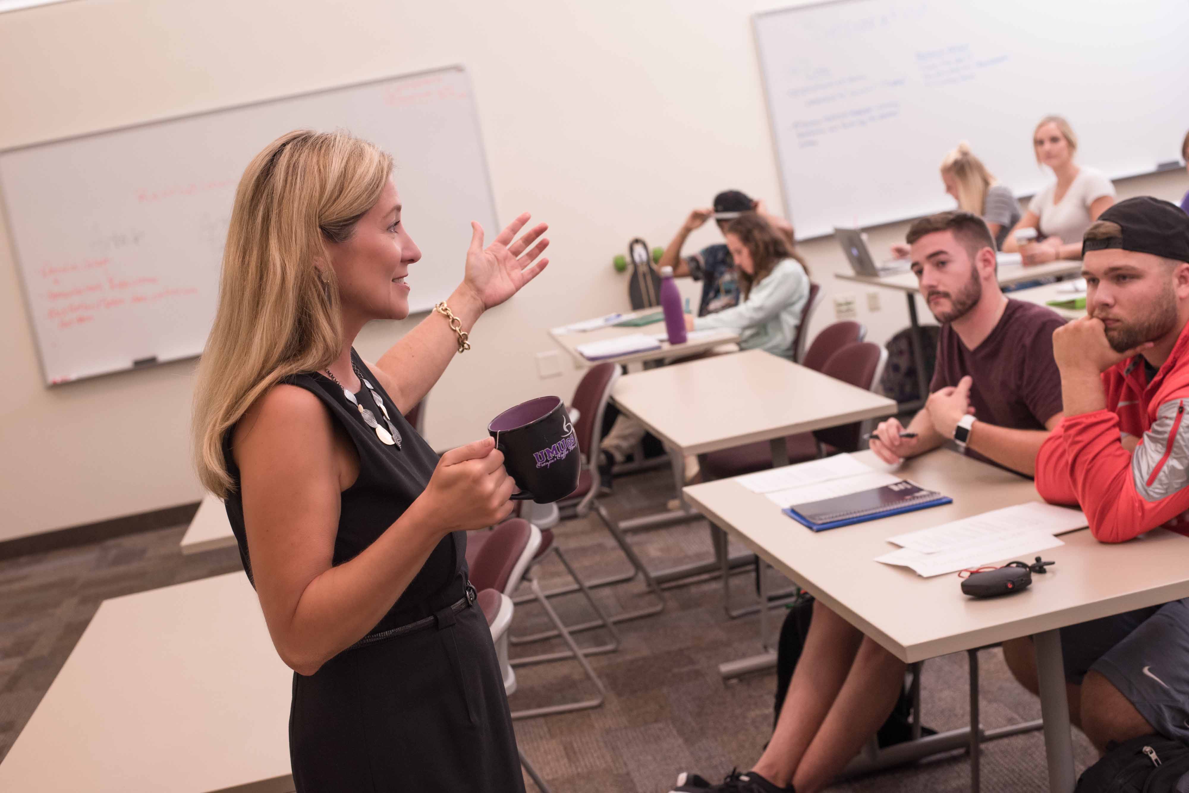 Dr. Jamie Capuzza teaching a class 