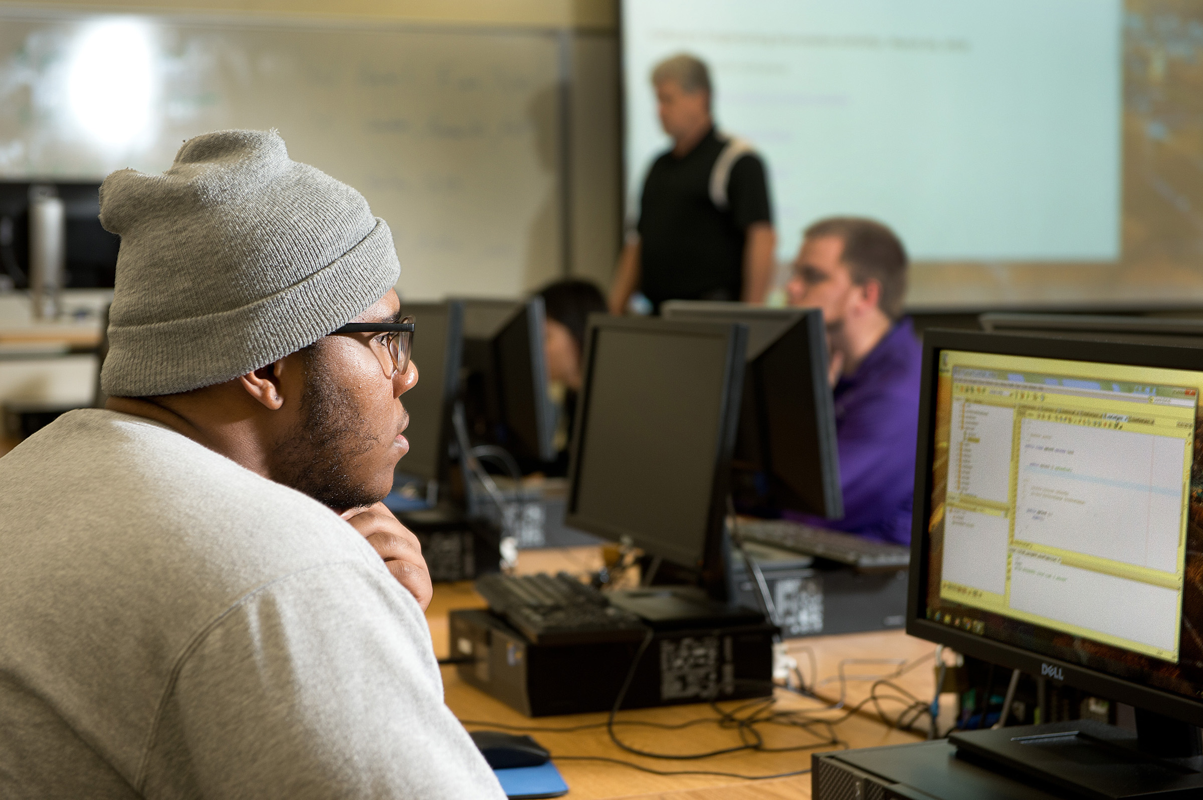 Computer Science students working in a computer lab 