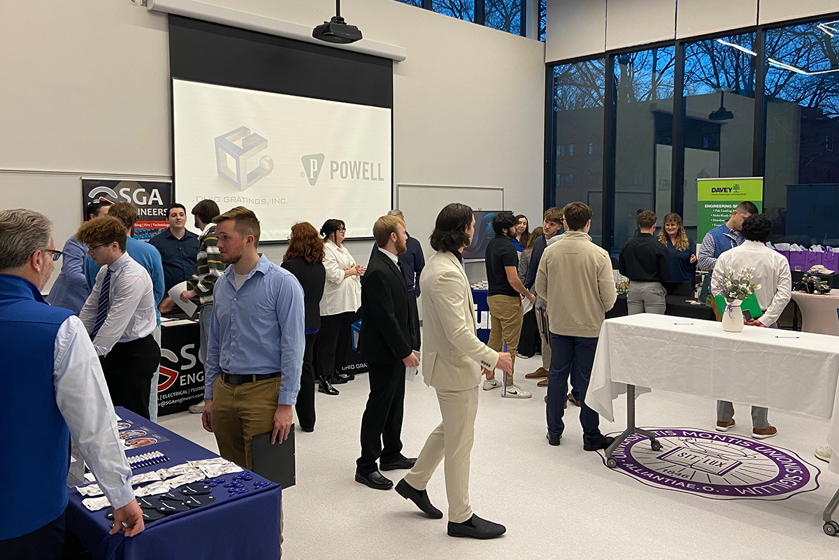 Groups of students and professionals at Networking Event