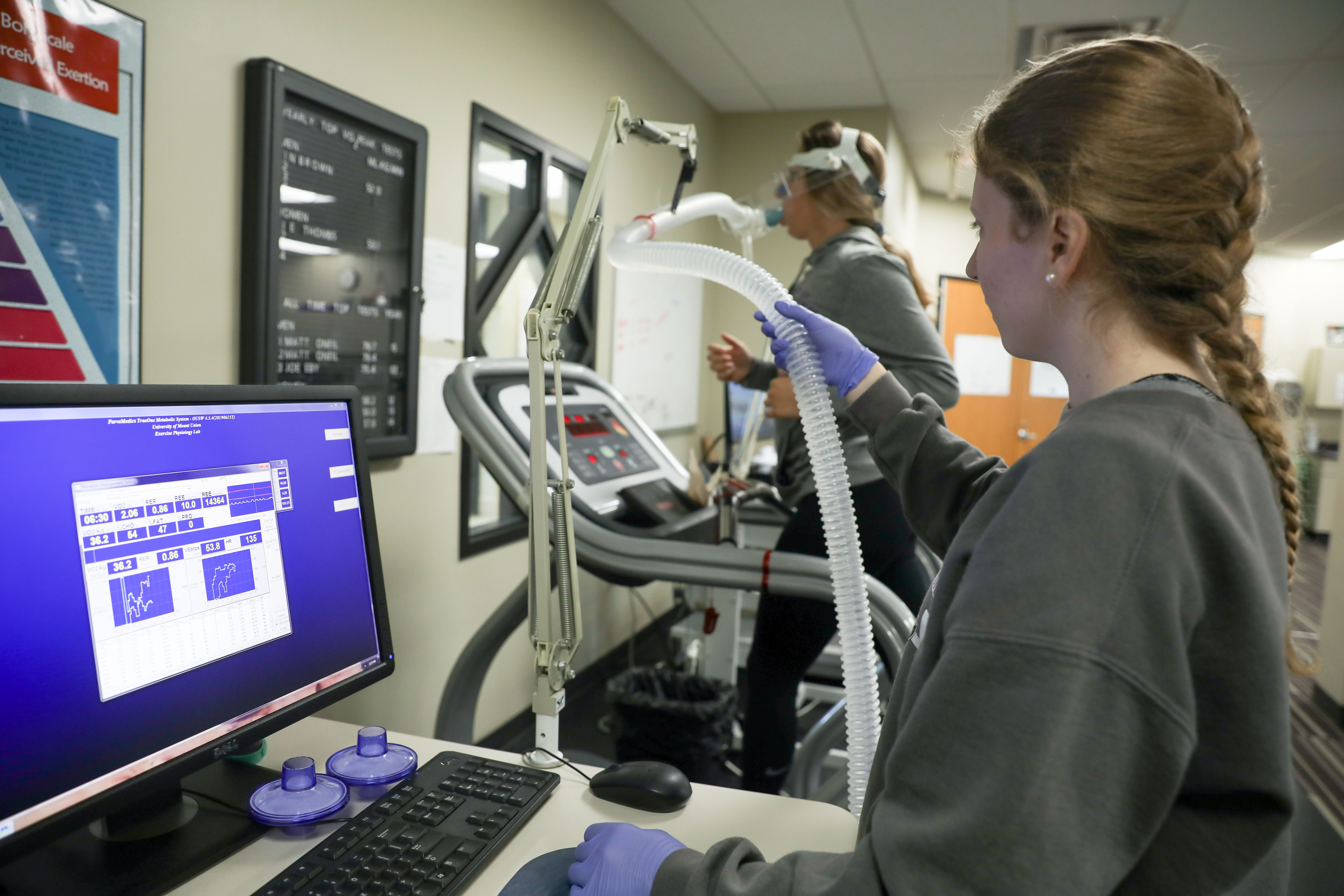 Exercise science students perform and monitor a running test