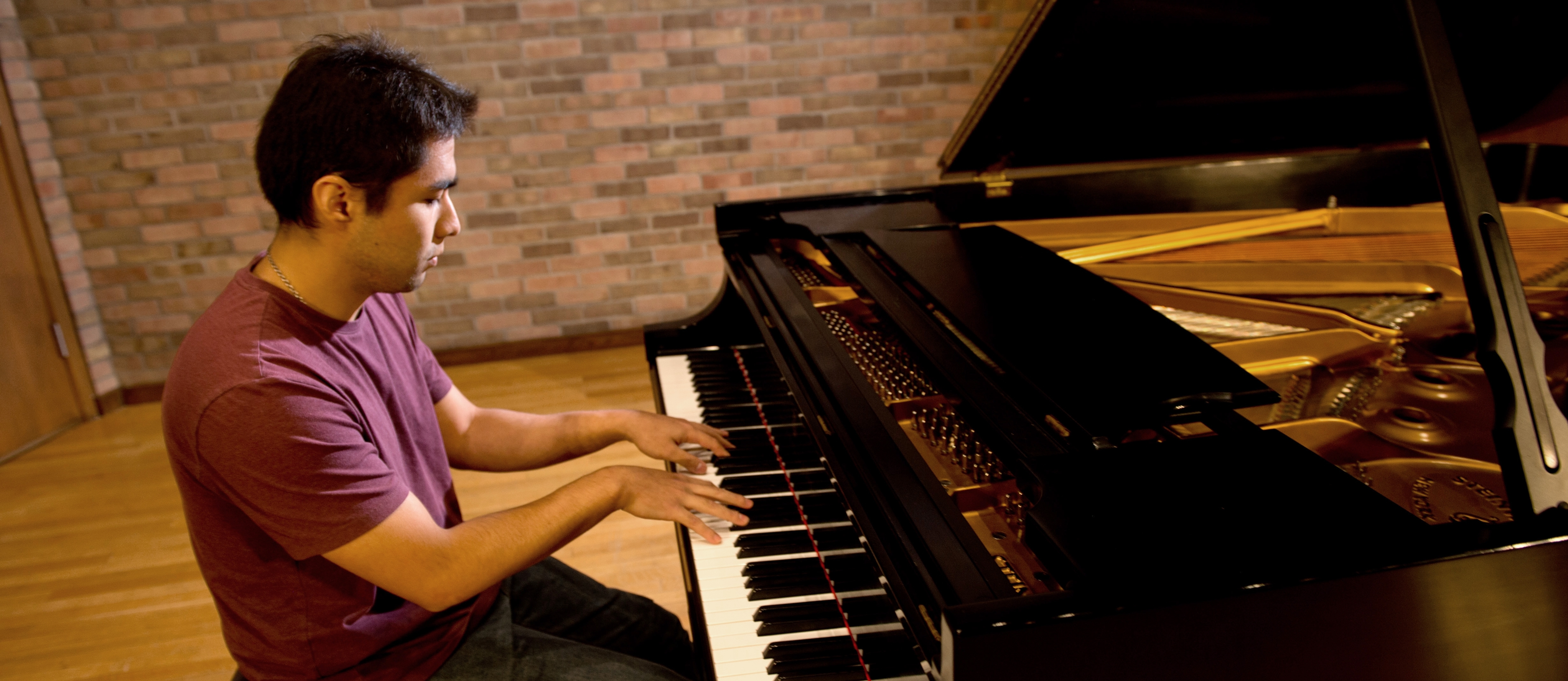 Mount Union student playing the piano.