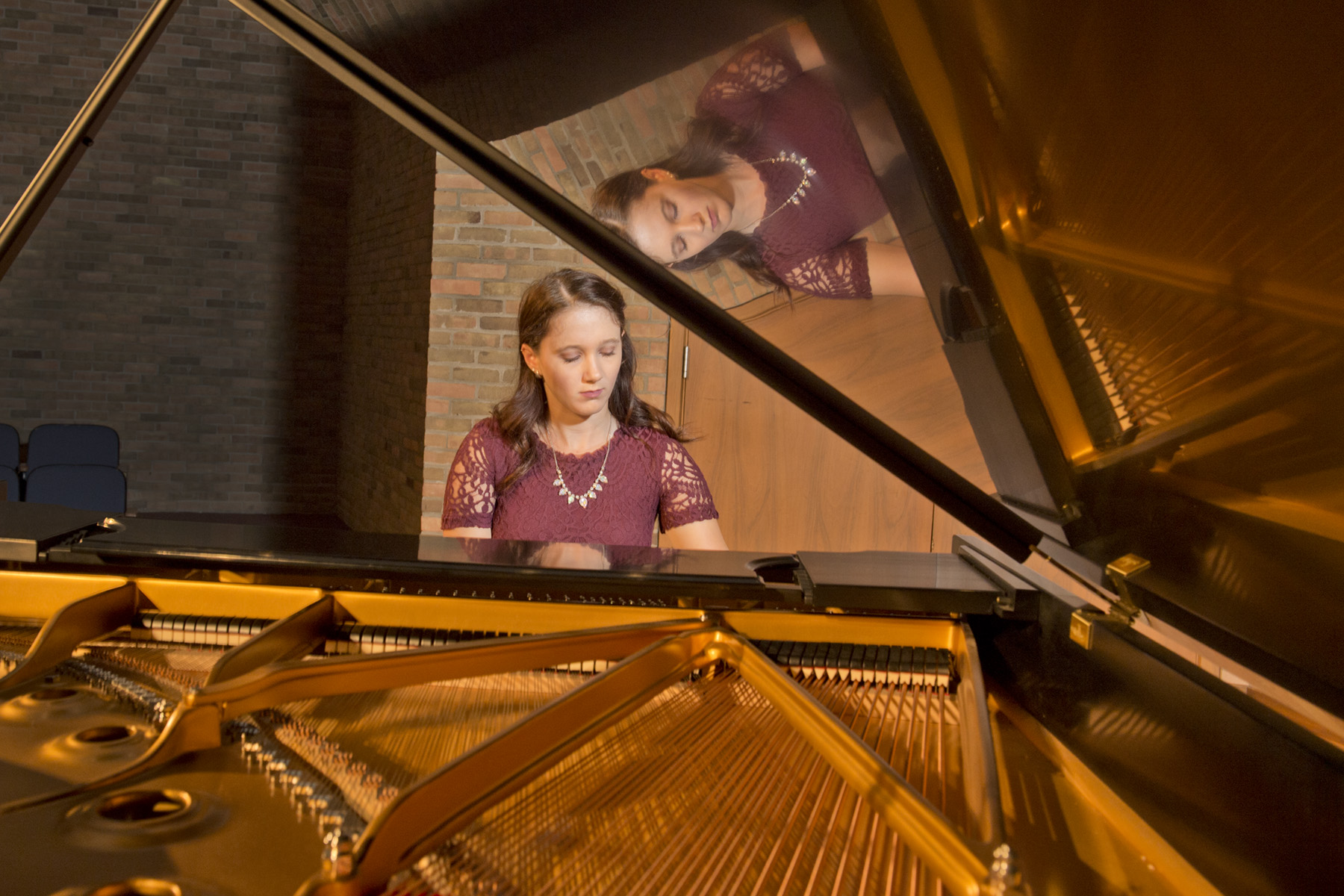 Student playing piano