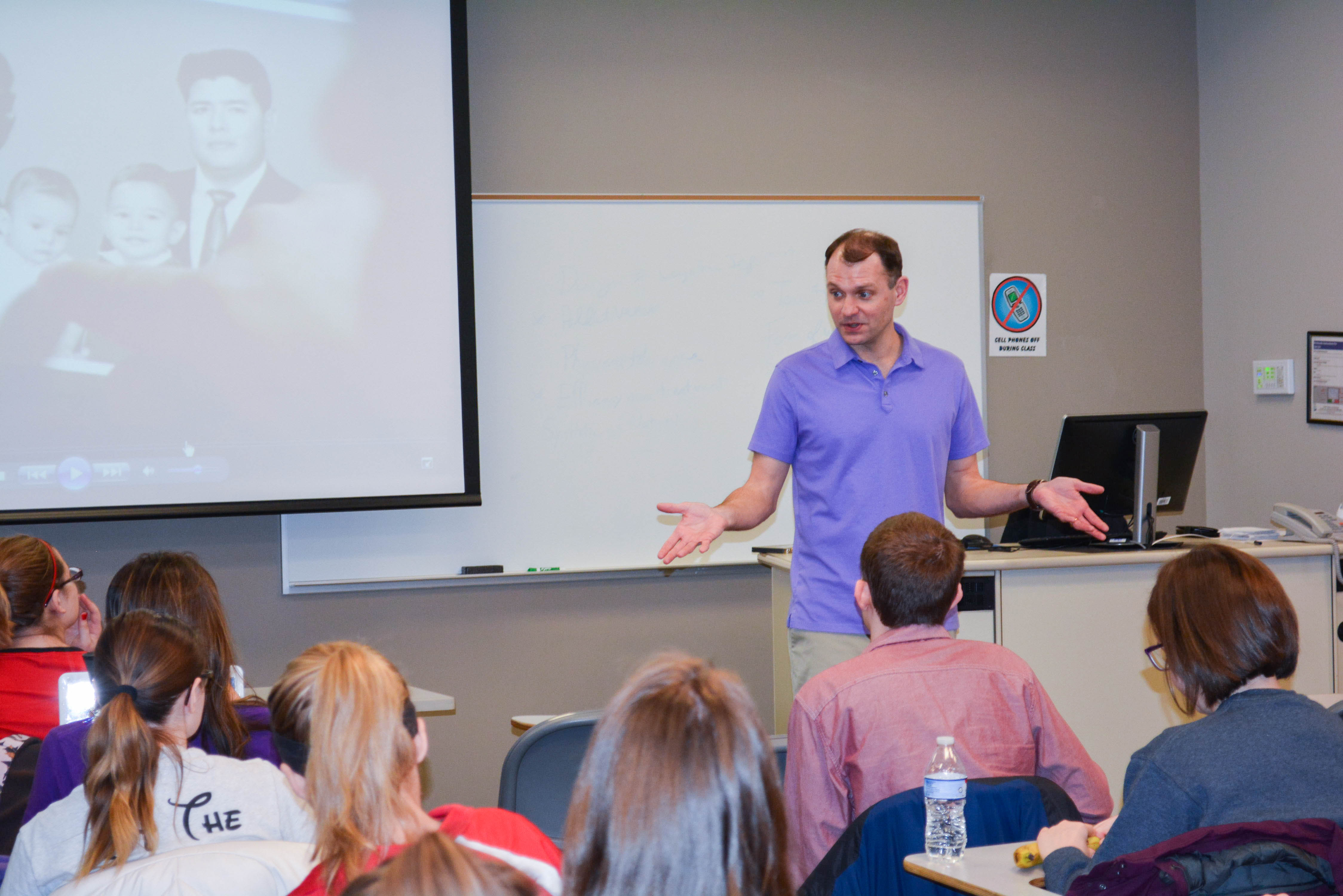 Human development and family science professor and students in a classroom 