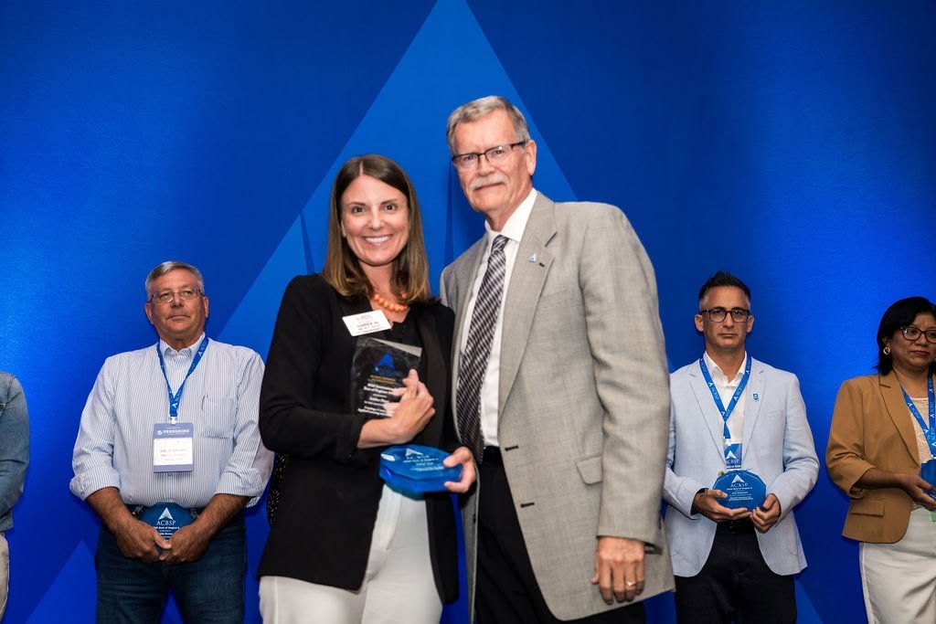Amber Hunt accepting award