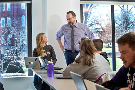 professor speaking with student