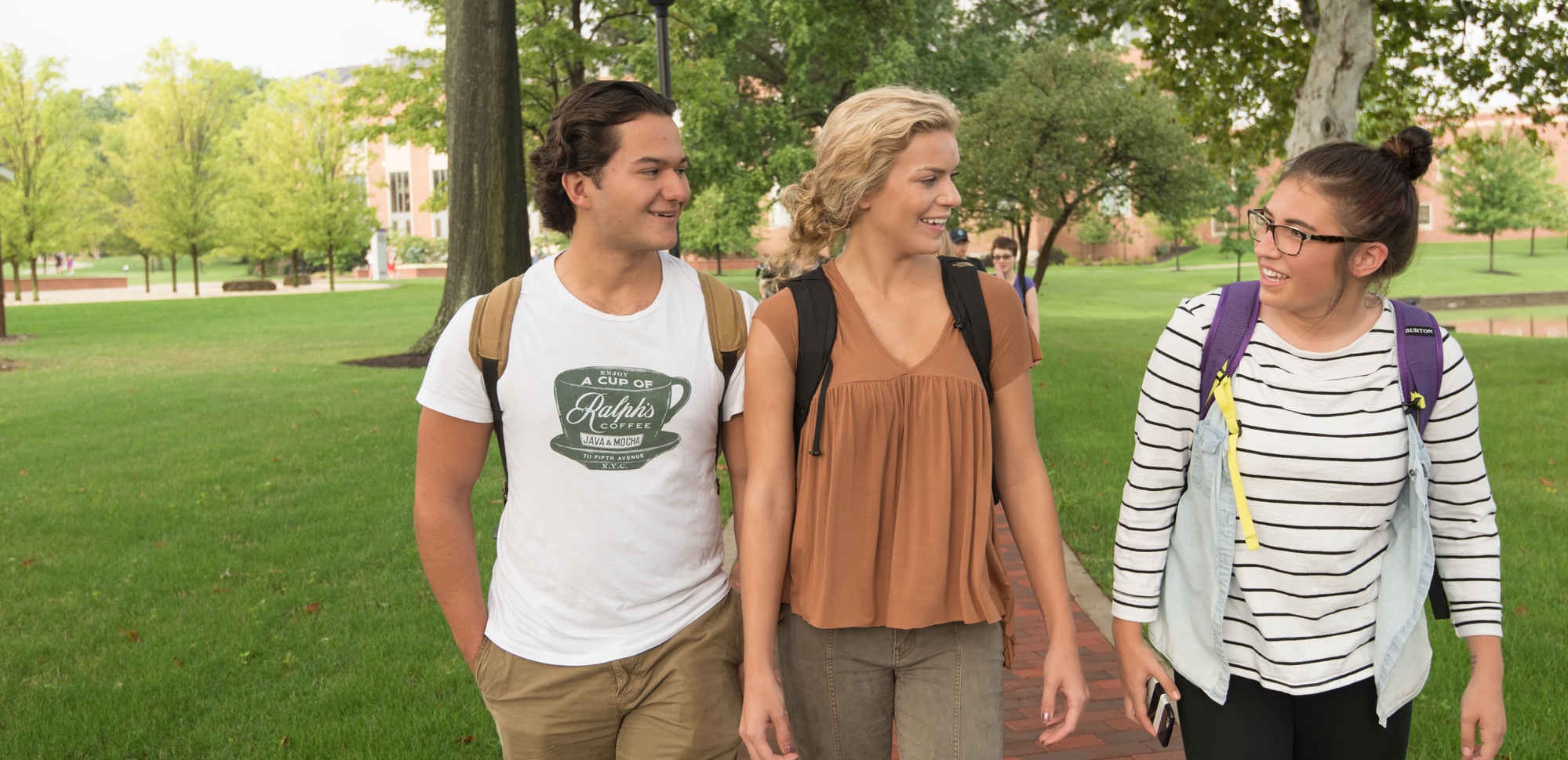 students walking by lakes