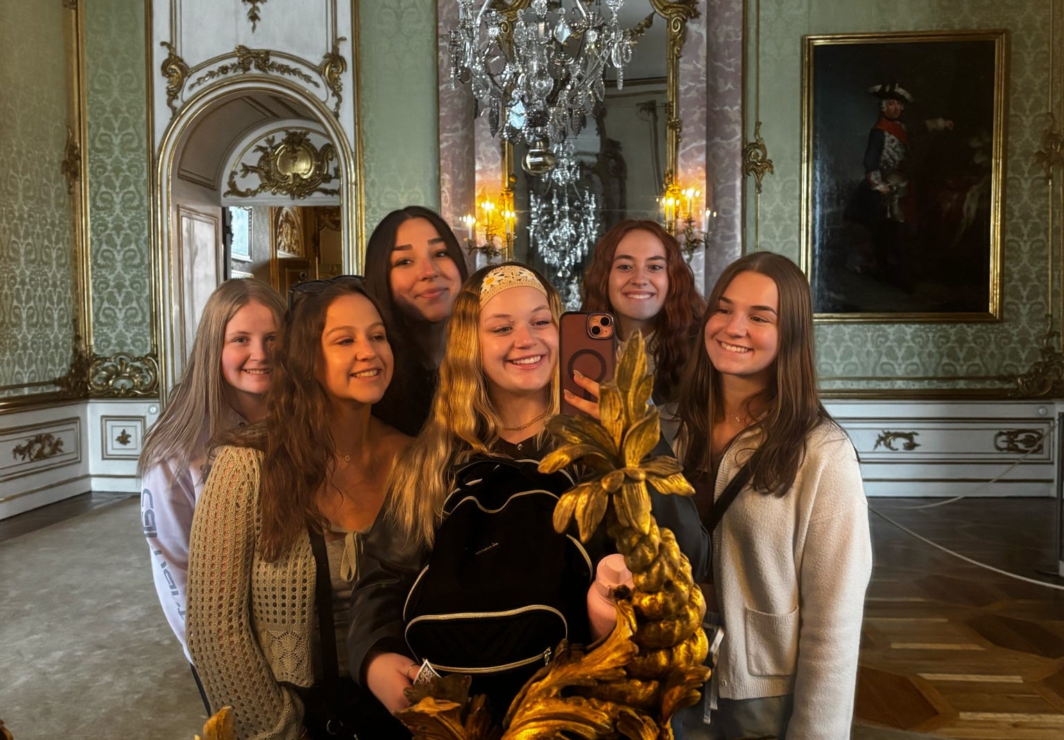 Brass '28 (front) and other students touring a museum in Germany.