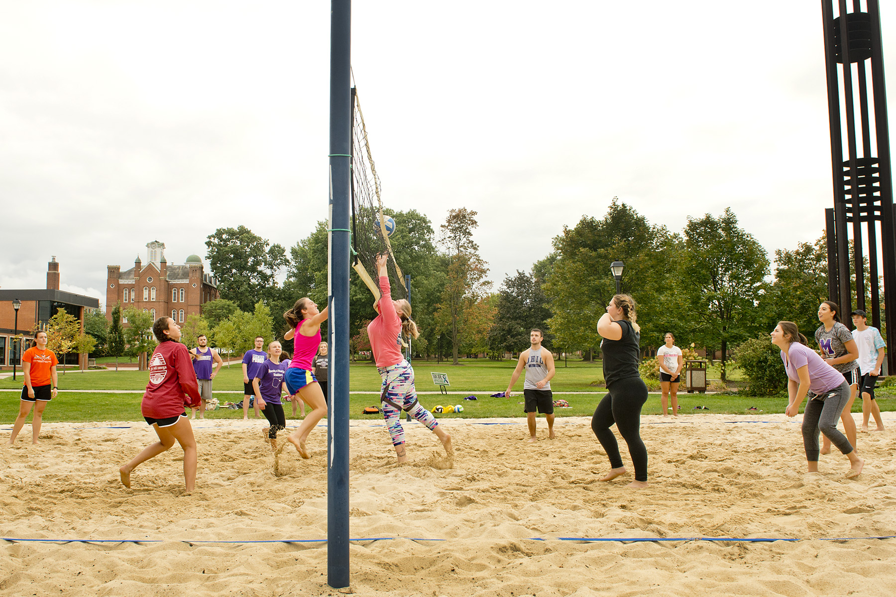 Students playing volleyball