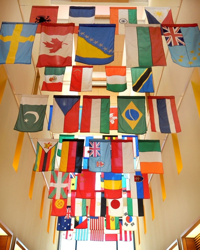 Country flags hanging in a hallway on Mount Union's campus.