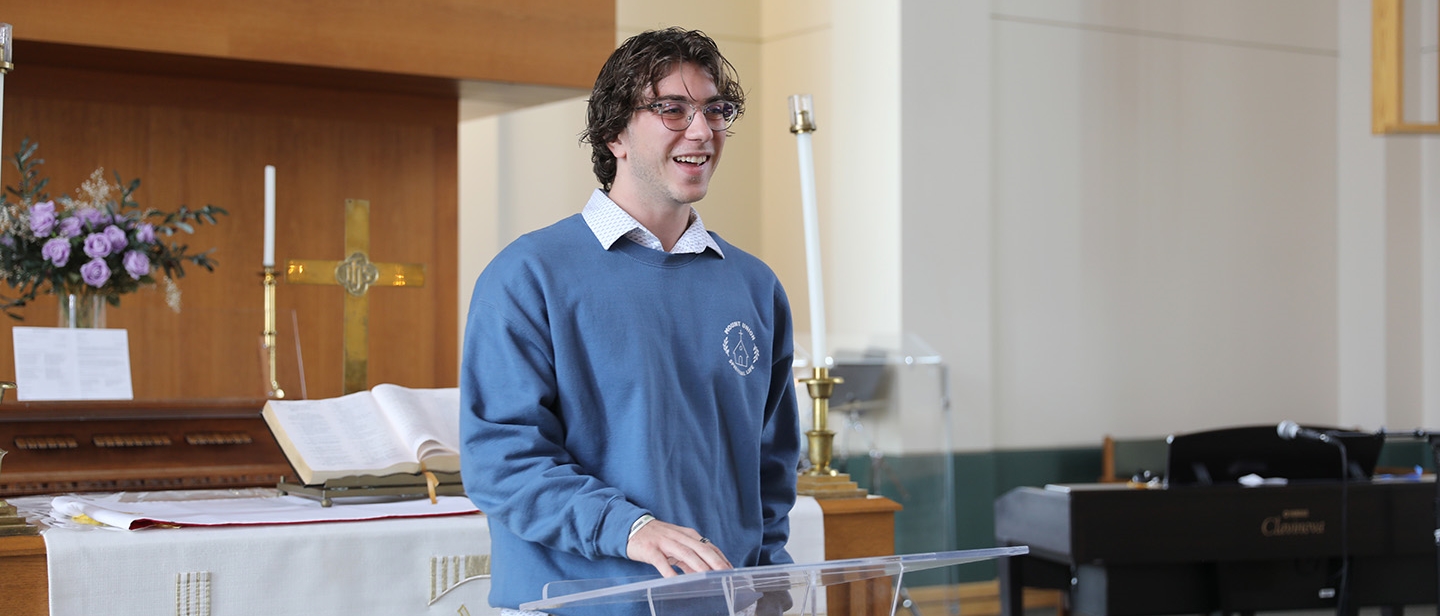 Mount Union student in spiritual life meeting in the chapel.