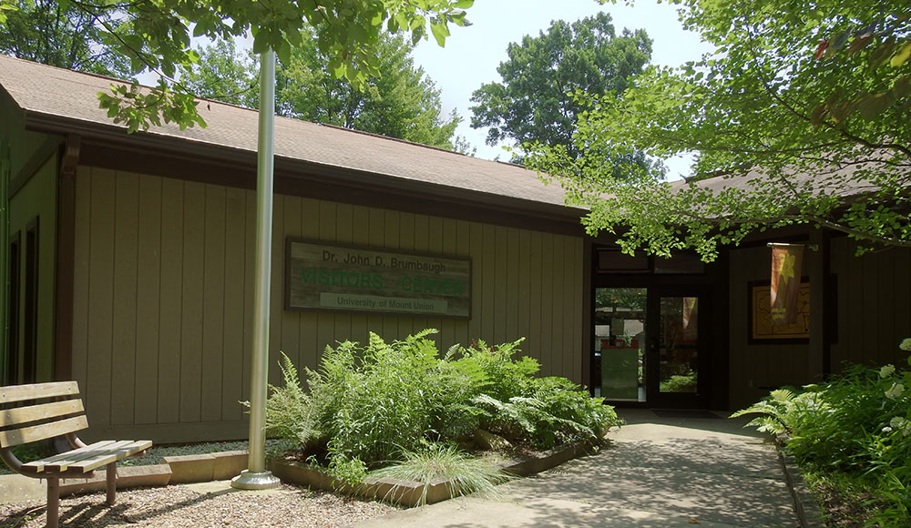 Huston-Brumbaugh Nature Center sign on a building