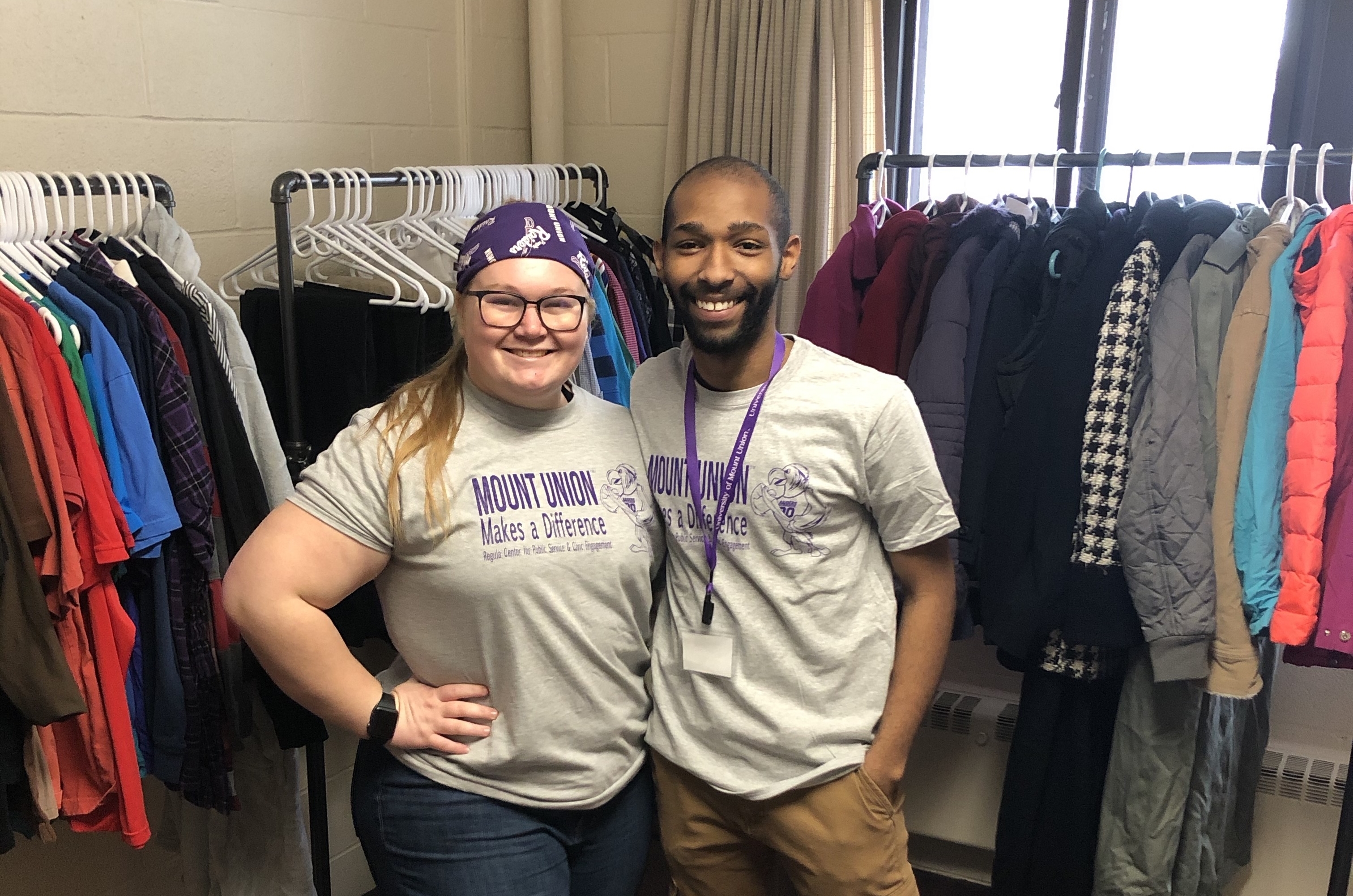 Students in front of clothes pantry