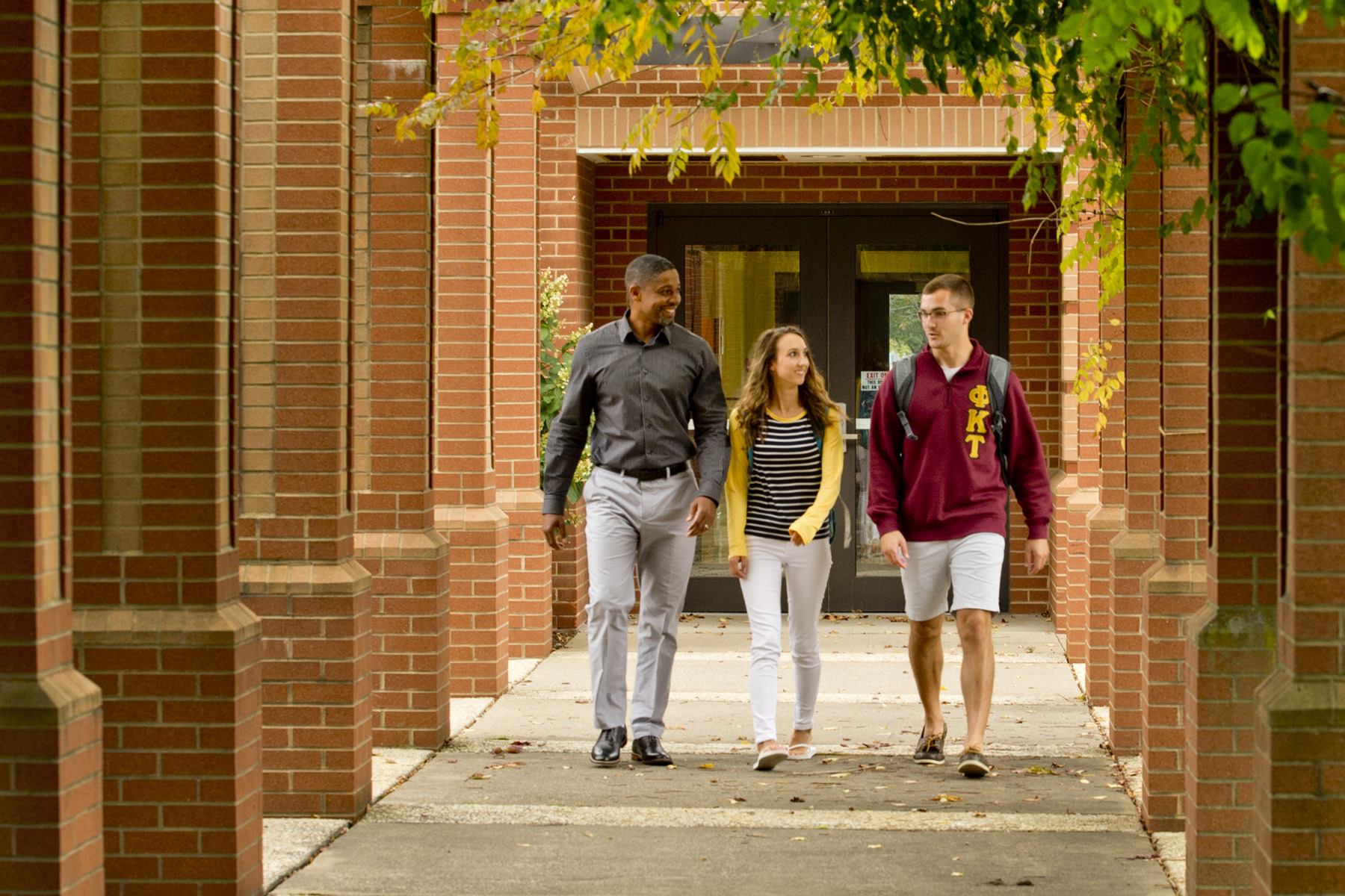 Students walking on campus.
