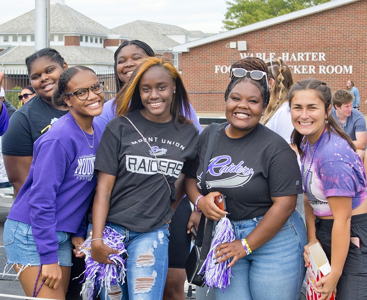 Mount Union students at football game.