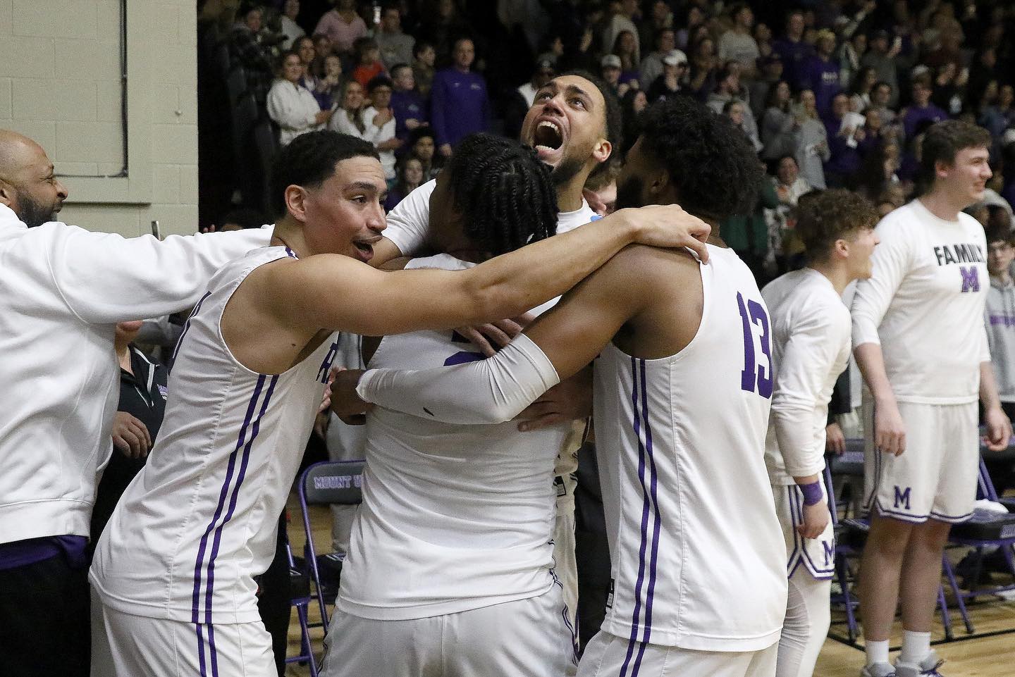 Purple Raider men's basketball team celebrating after Elite 8 win