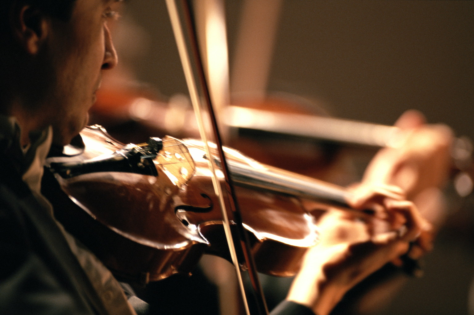 Close up of student playing violin