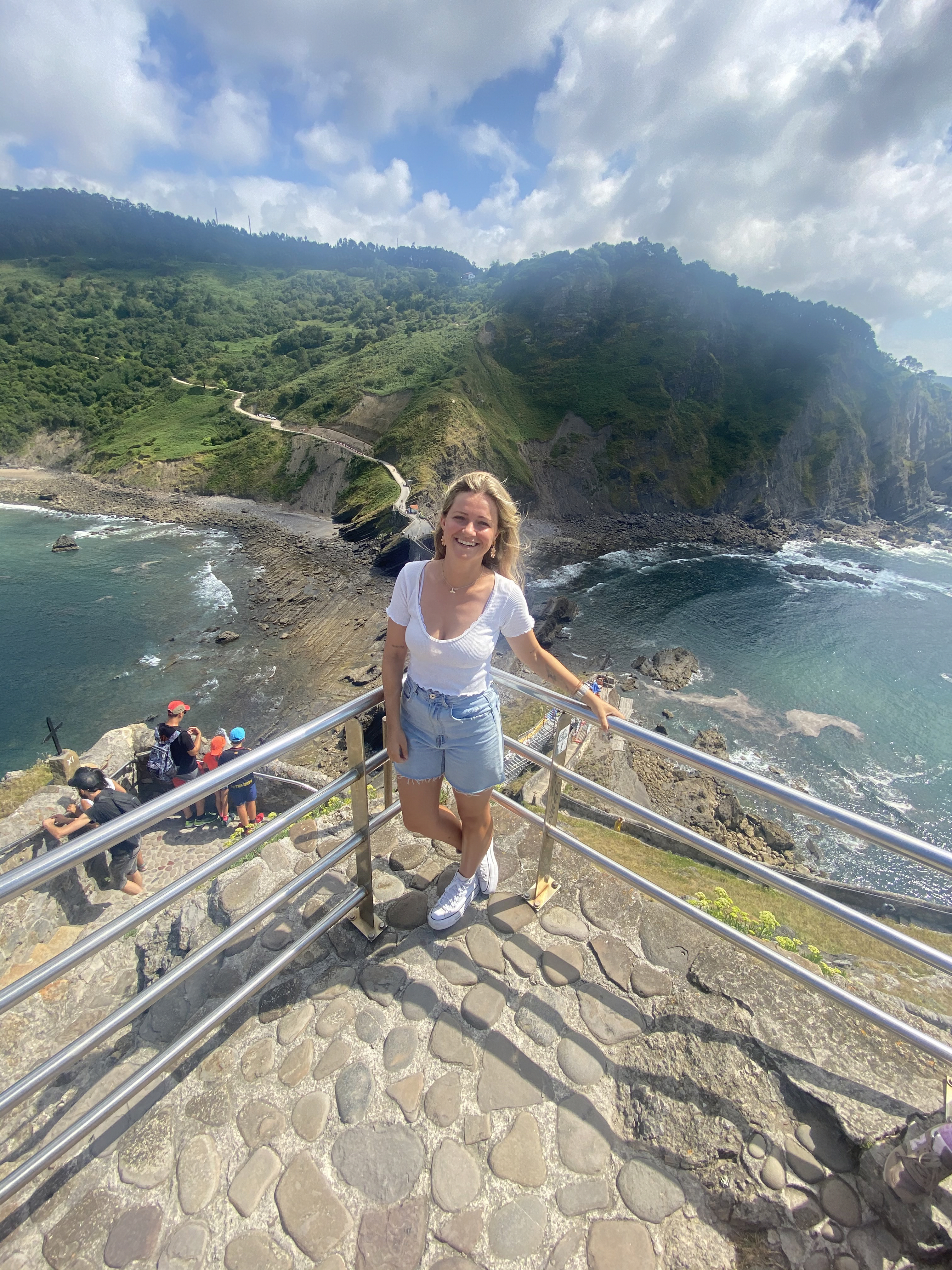 Ainhoa Garcia Michelena stands in front of a nature scene in her hometown