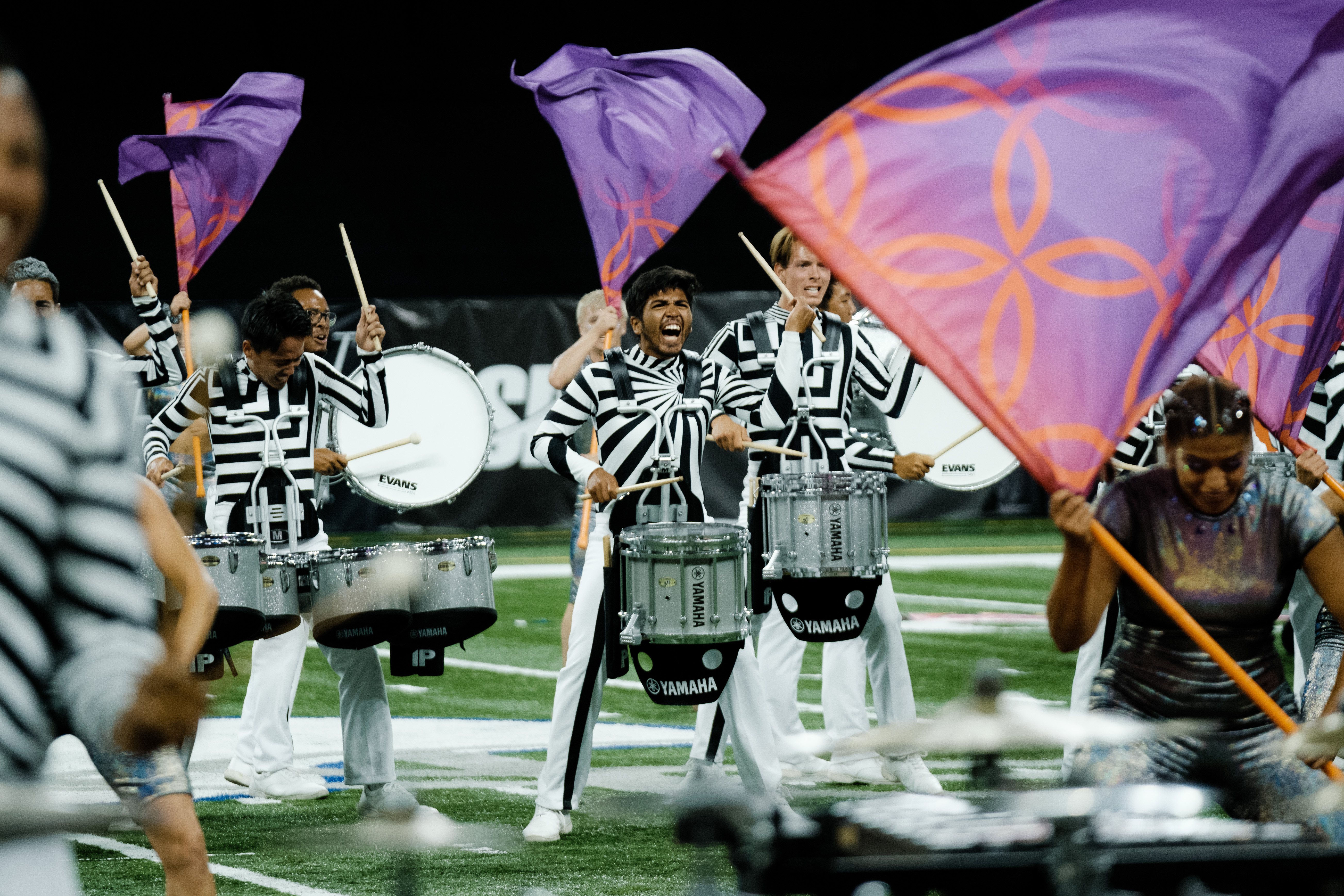 bluecaots performers playing drums