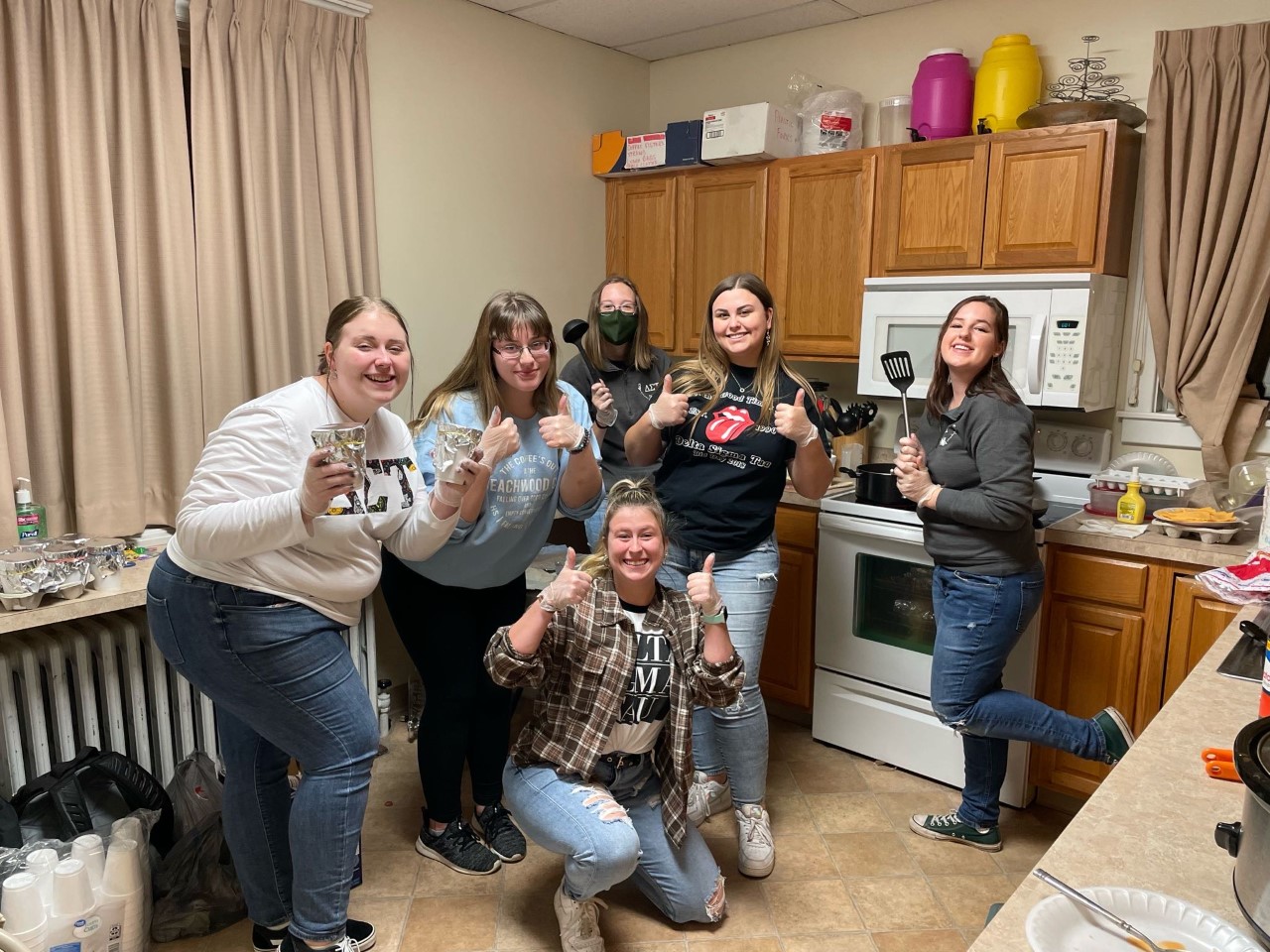 Wilke and DST sorority at annual grilled cheese event.