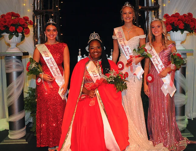members of the 2022 carnation queen court with queen kayla martin seated second from left.