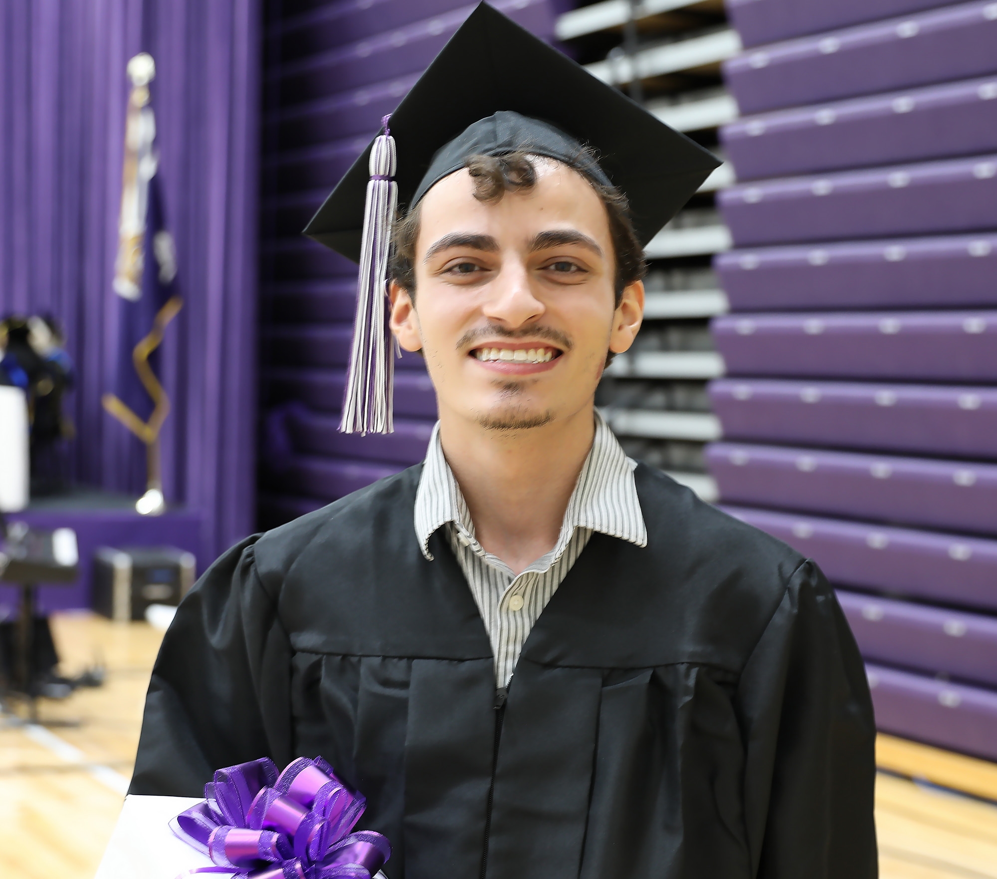 diaz palma in cap and gown with gift