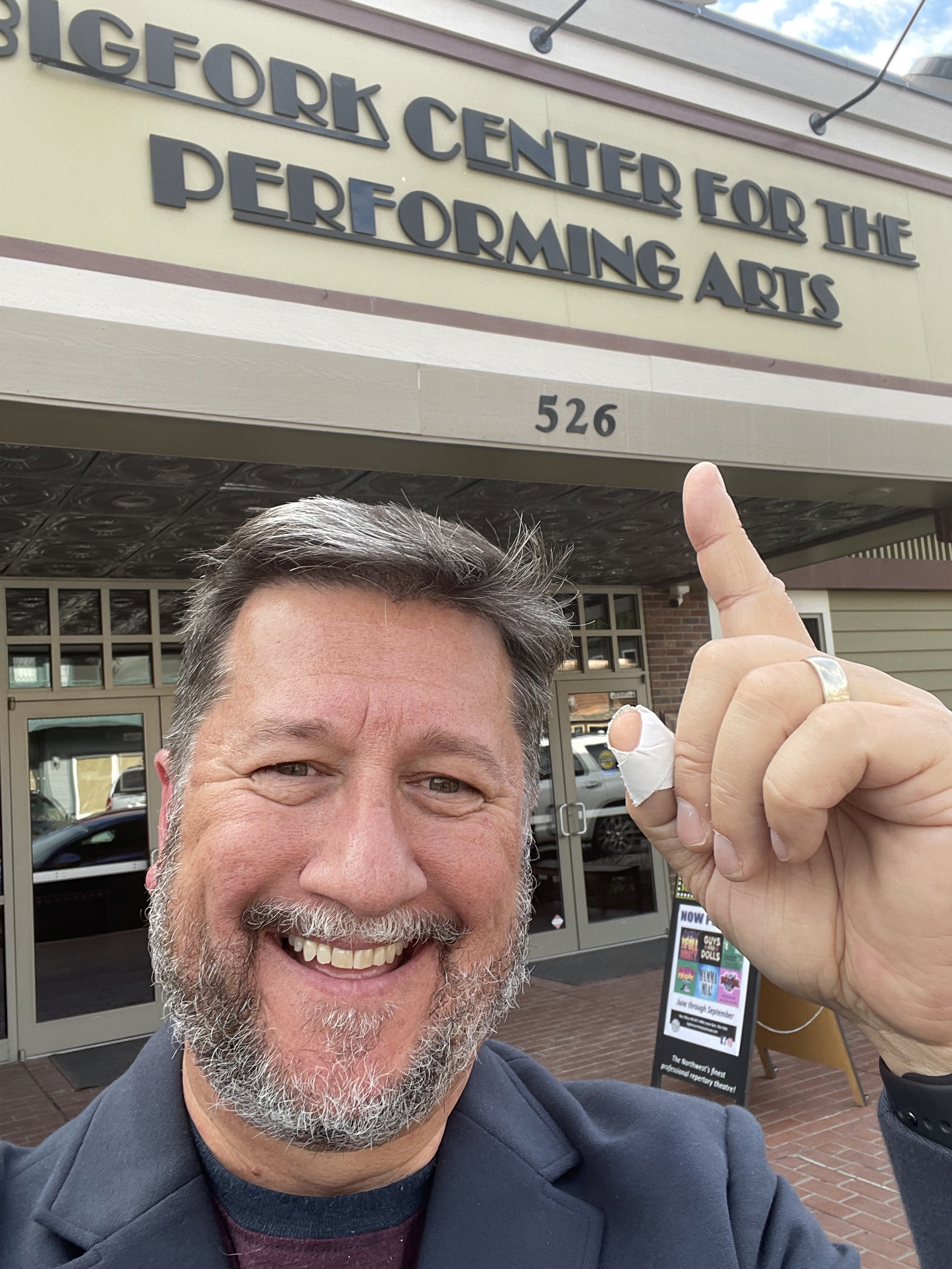 kevin kern pointing at marquee