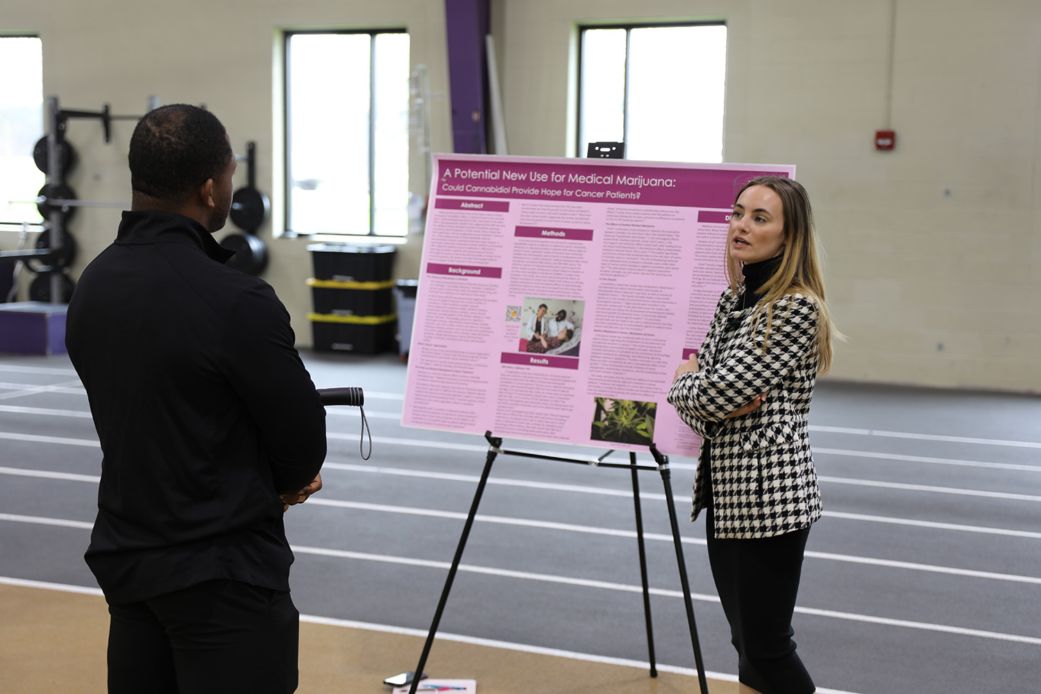 female student talking with man