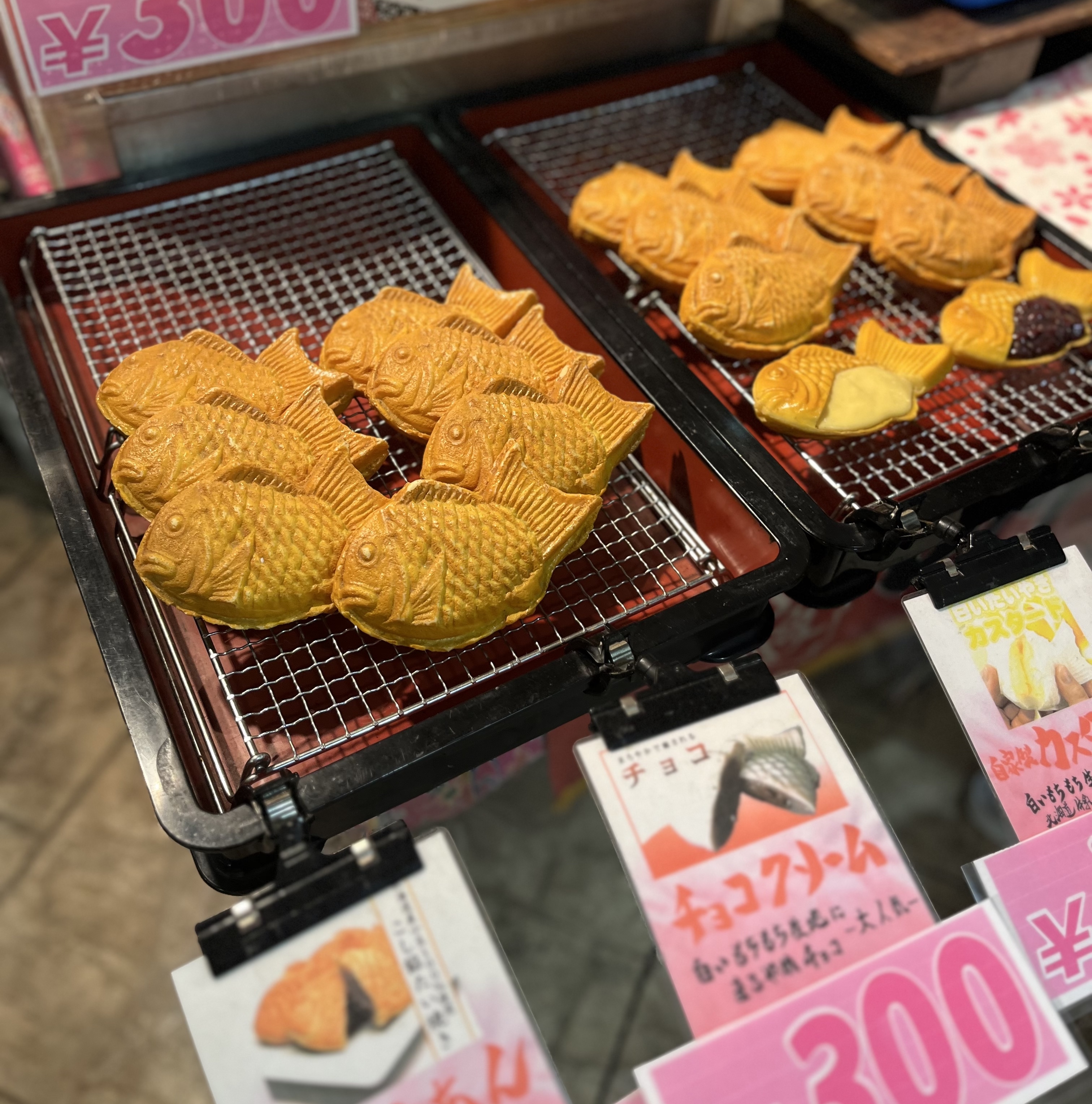 food in the shape of fish at a japanese market