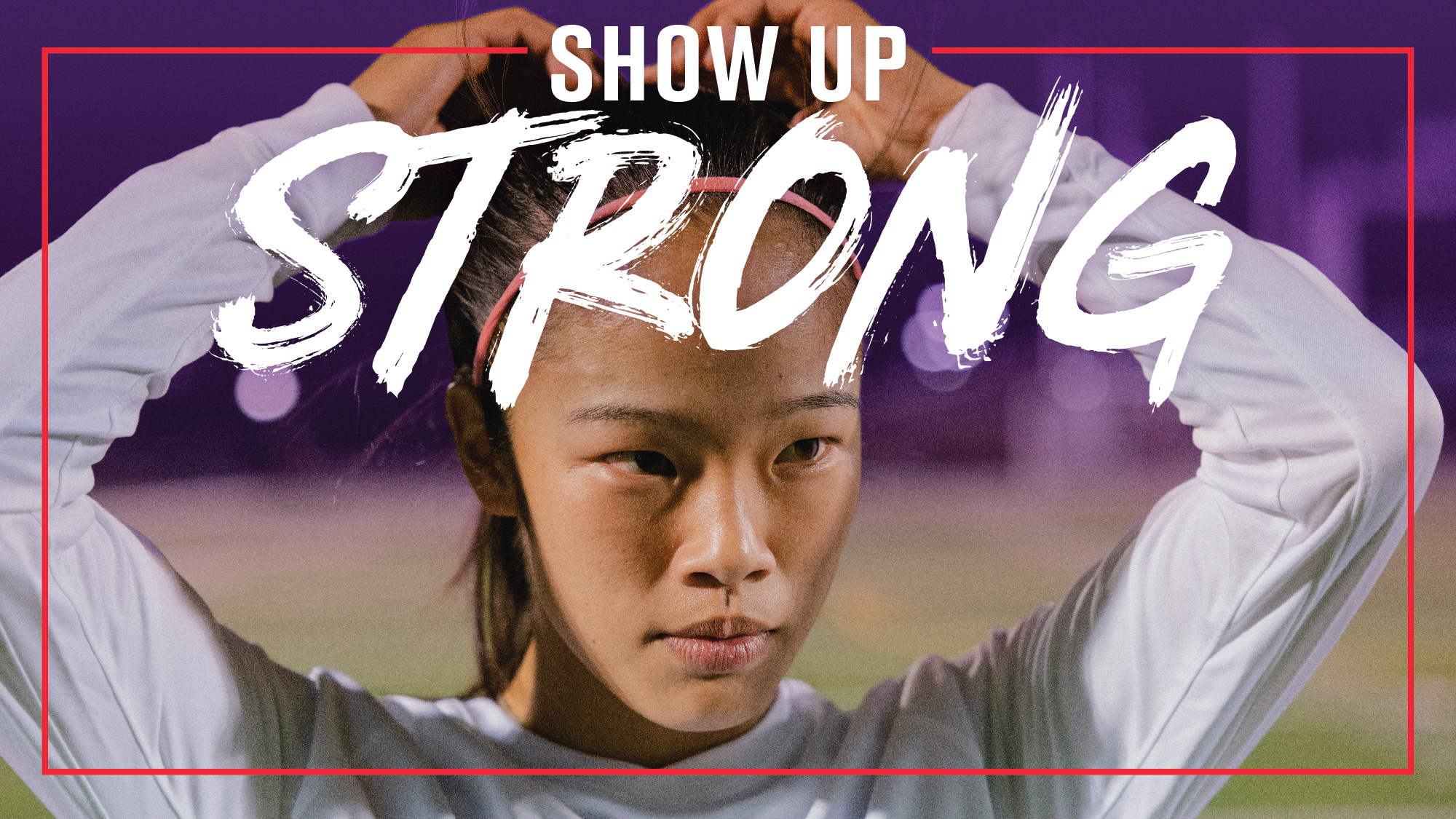 Women's soccer player with focused stare