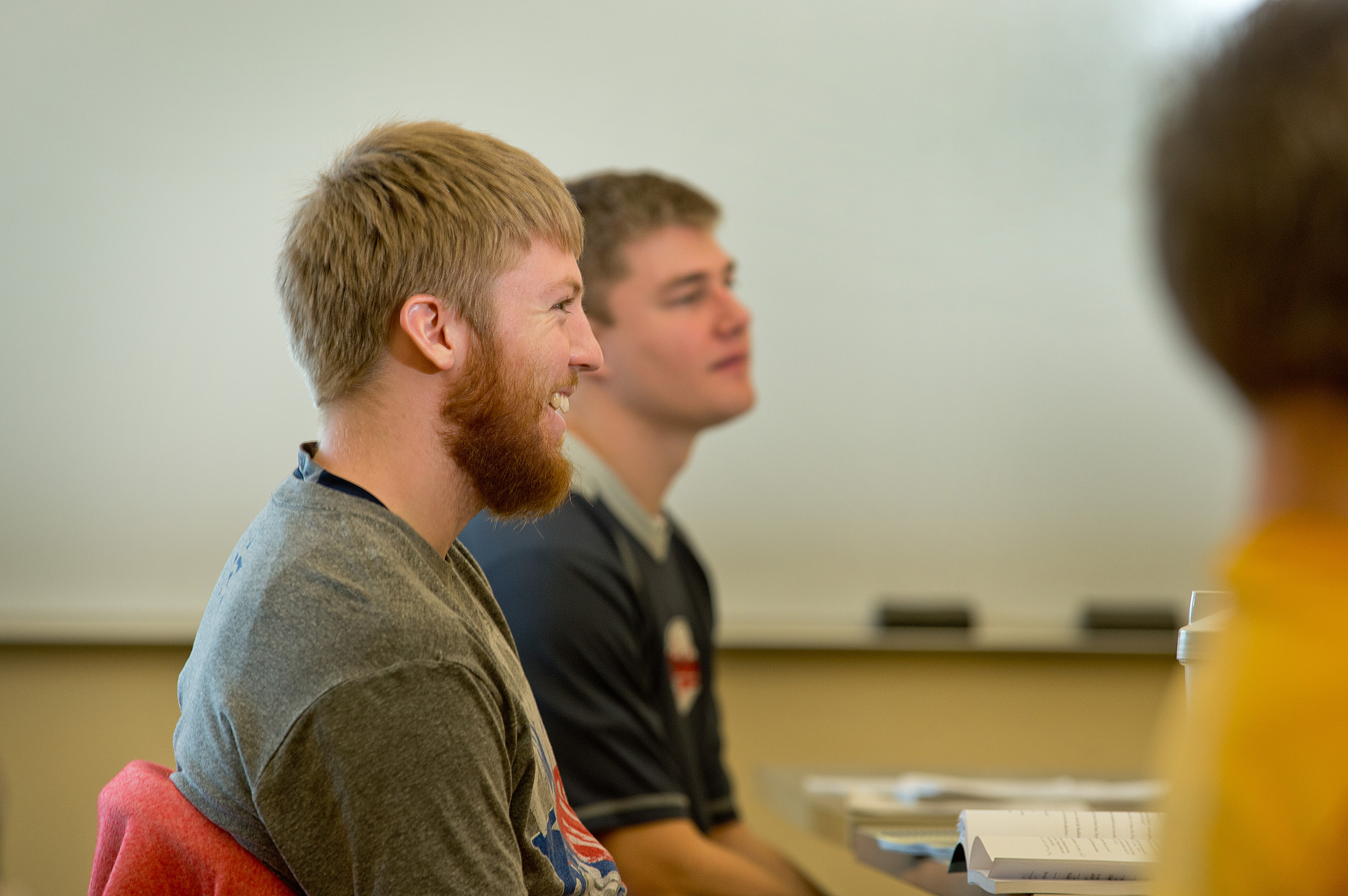 student smiling in class