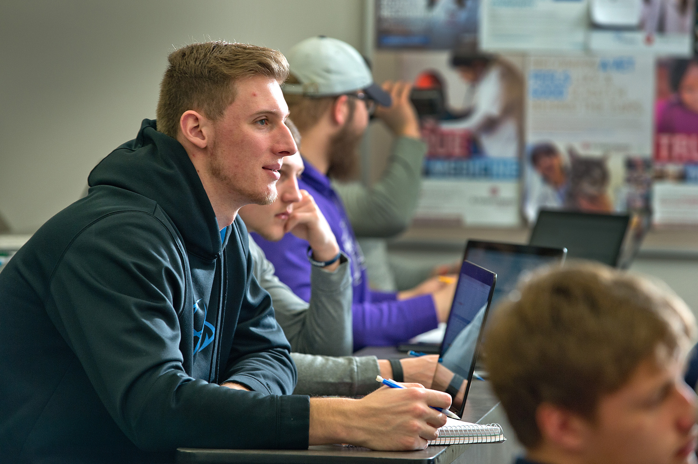 student smiling in class